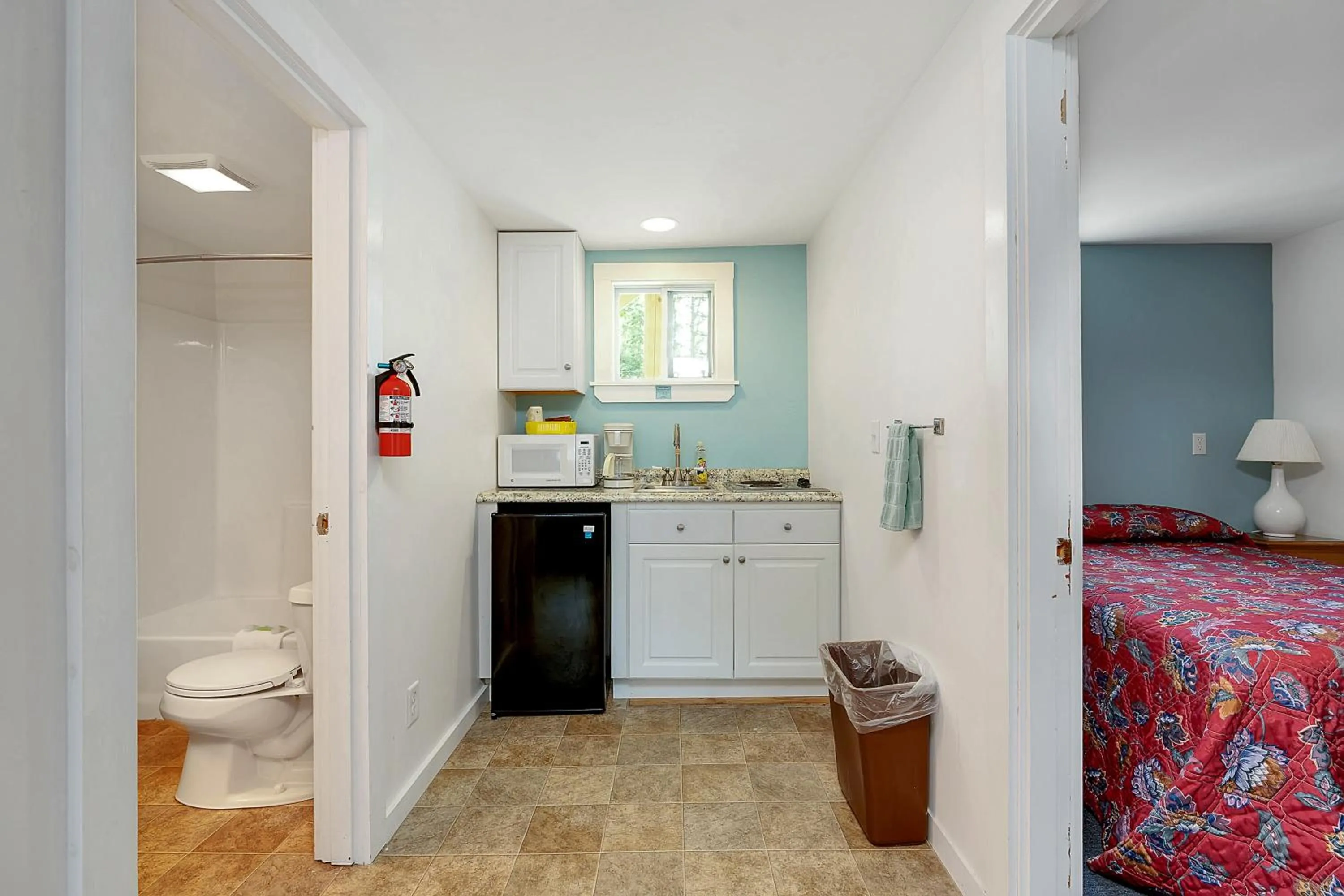 Bed in Ne'r Beach Motel