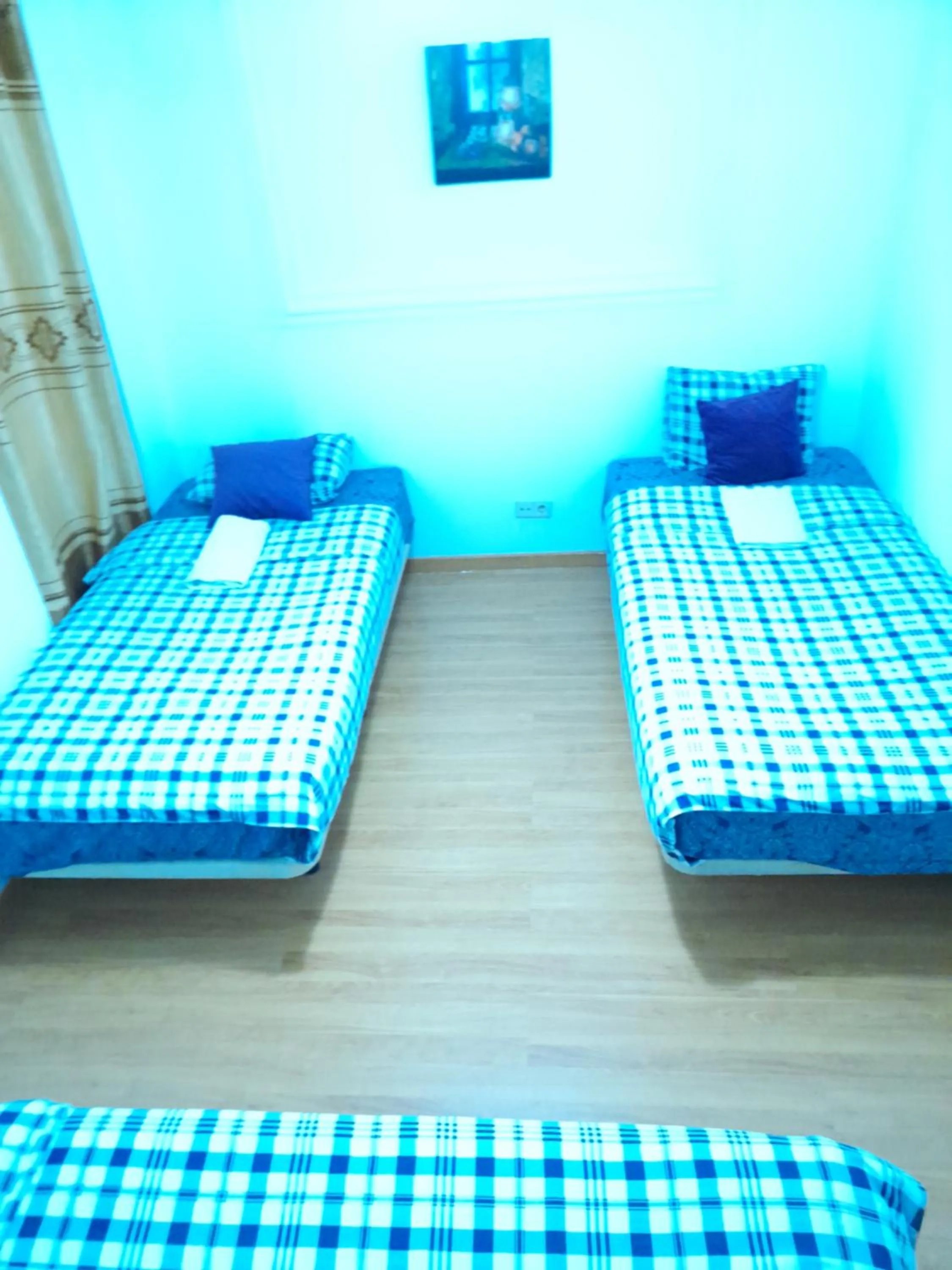 Bed in Garden Guest House