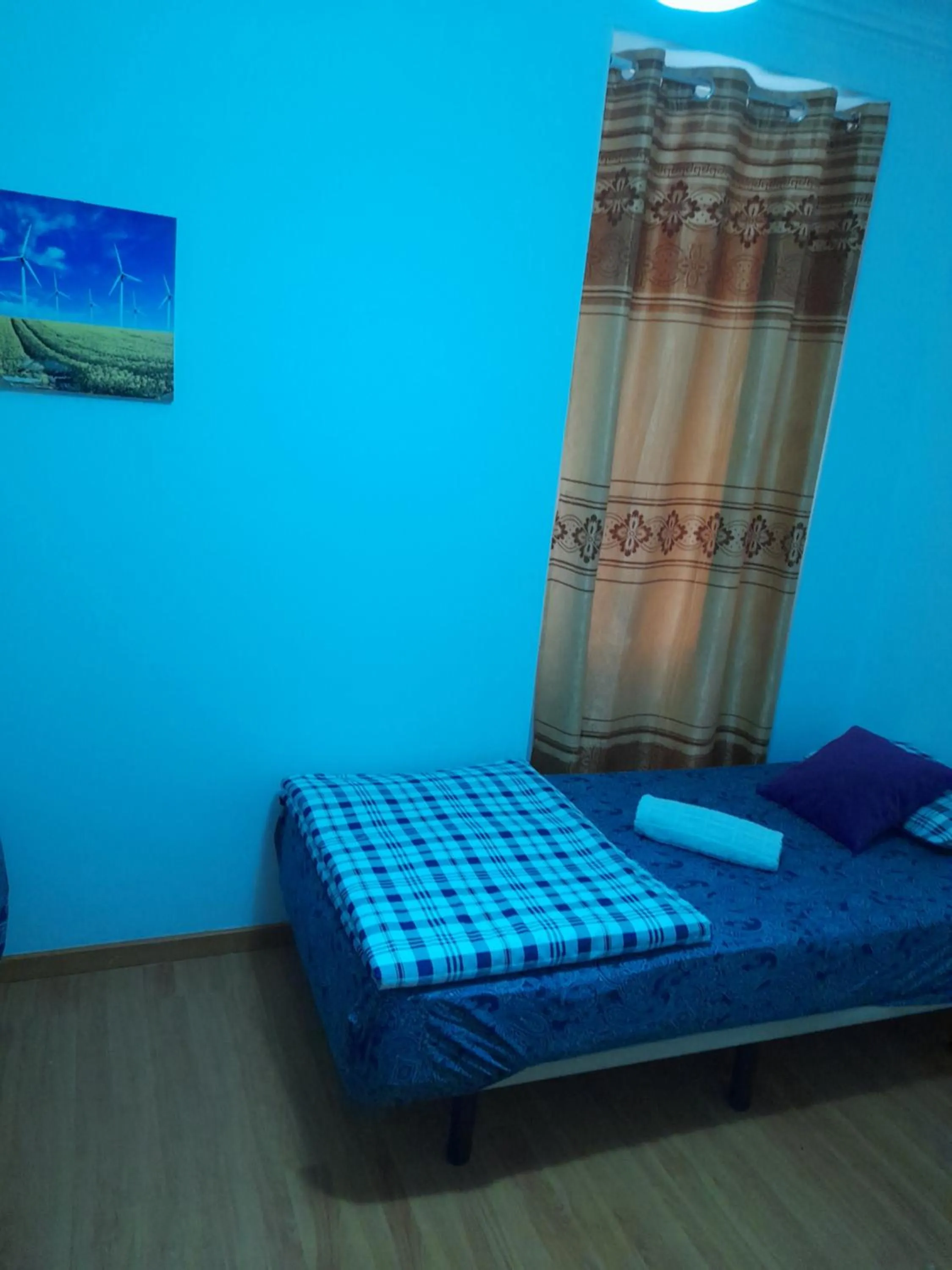 Bed in Garden Guest House