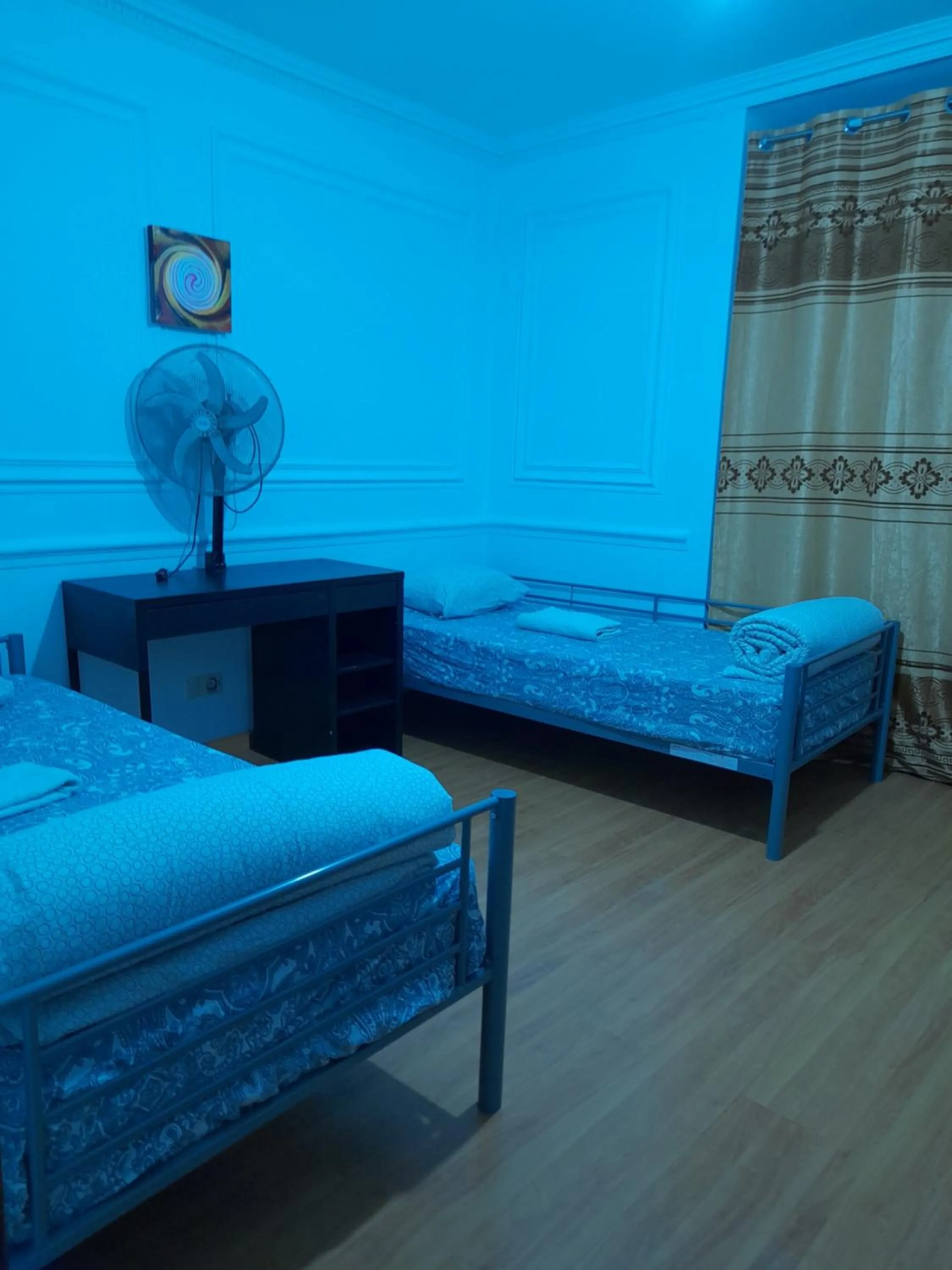 Bed in Garden Guest House