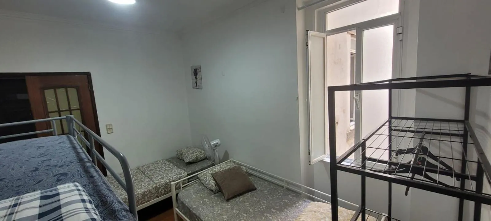 Bed in Garden Guest House