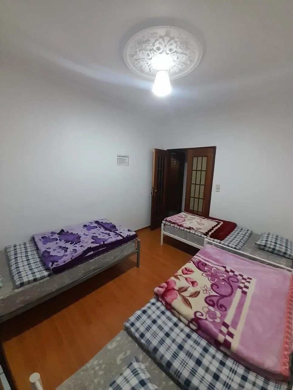 Bed in Garden Guest House