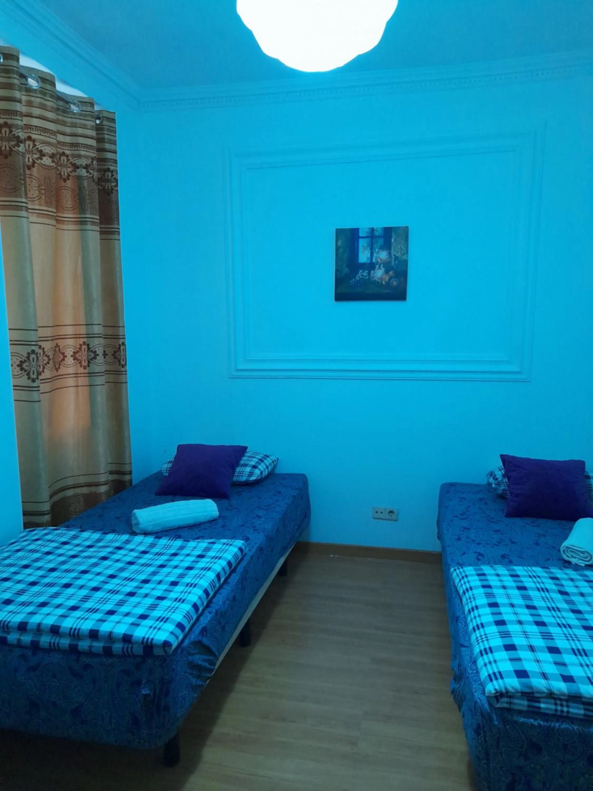 Bed in Garden Guest House