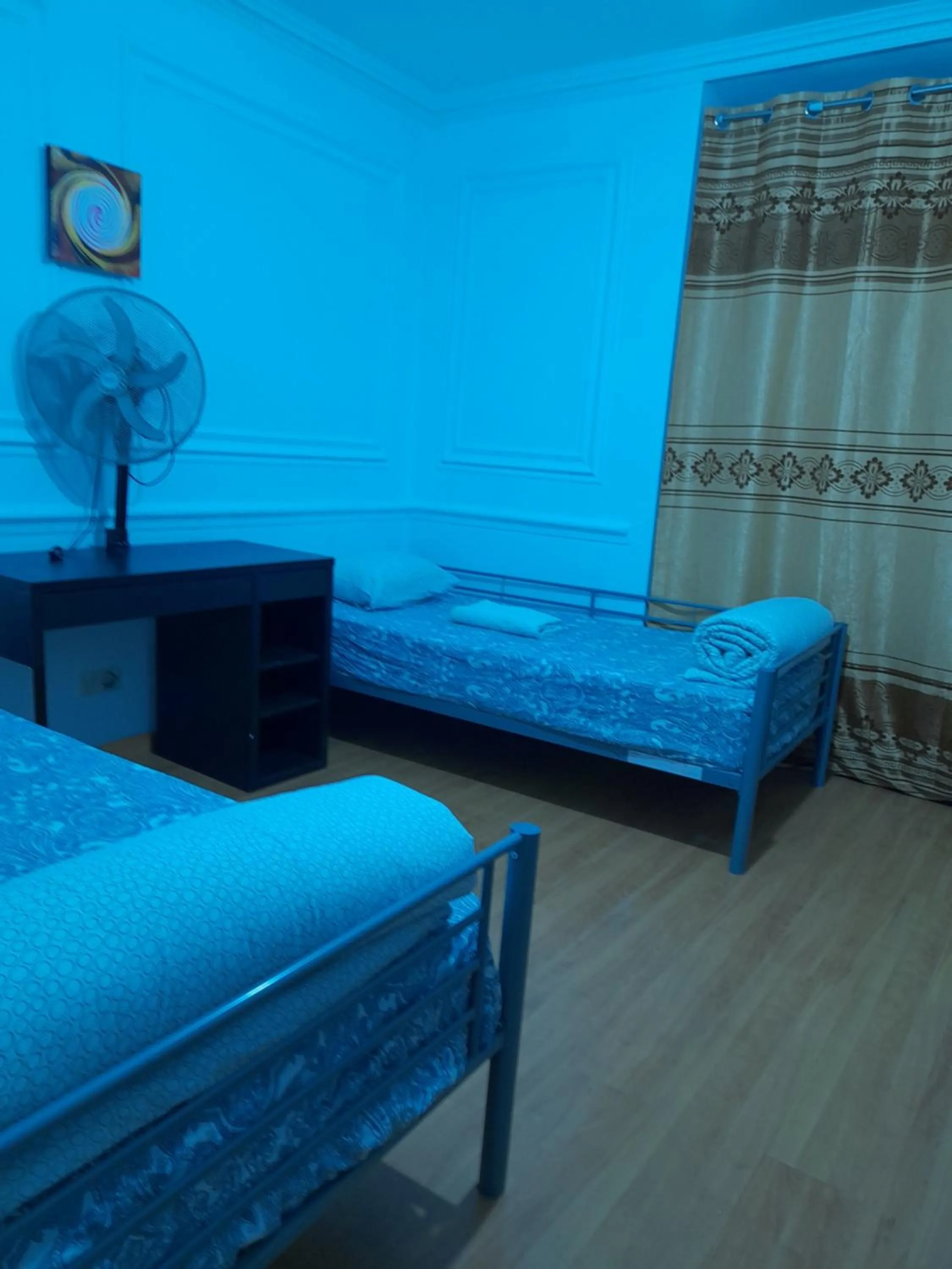 Bed in Garden Guest House