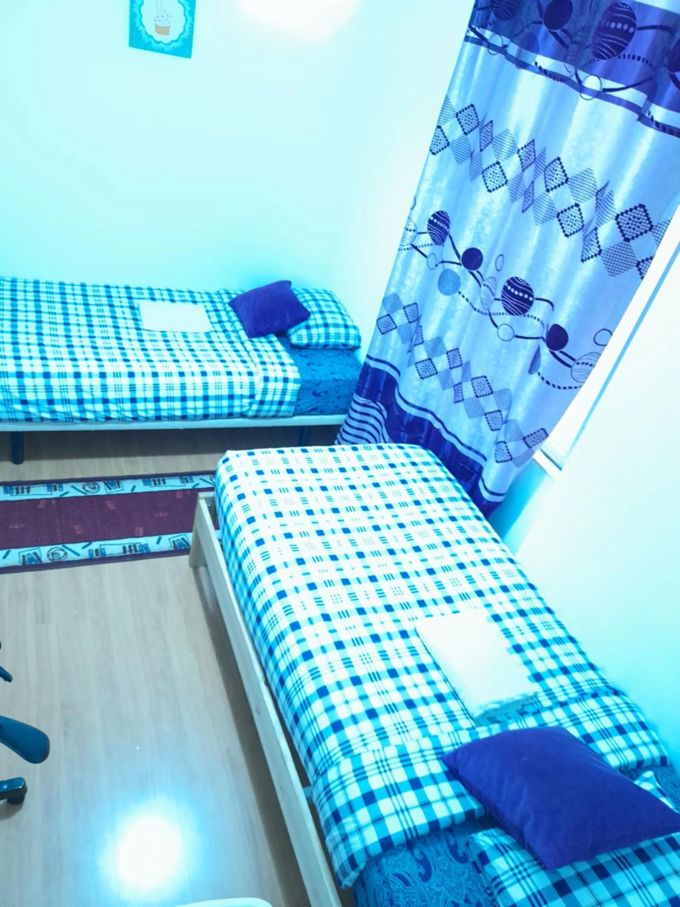 Bed in Garden Guest House