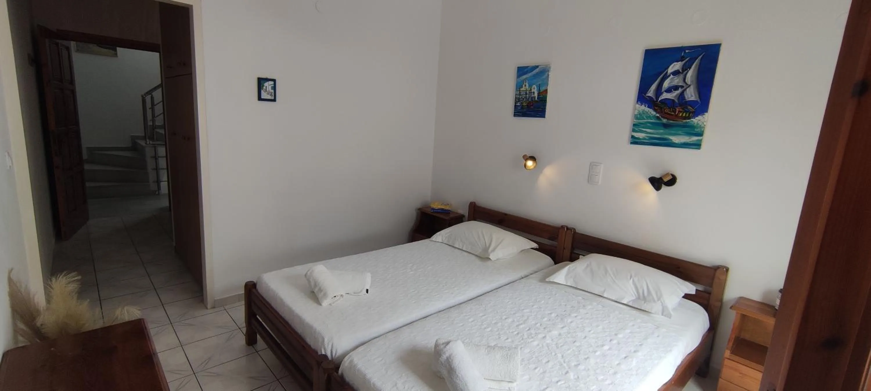 Bed in Kapetanos Rooms