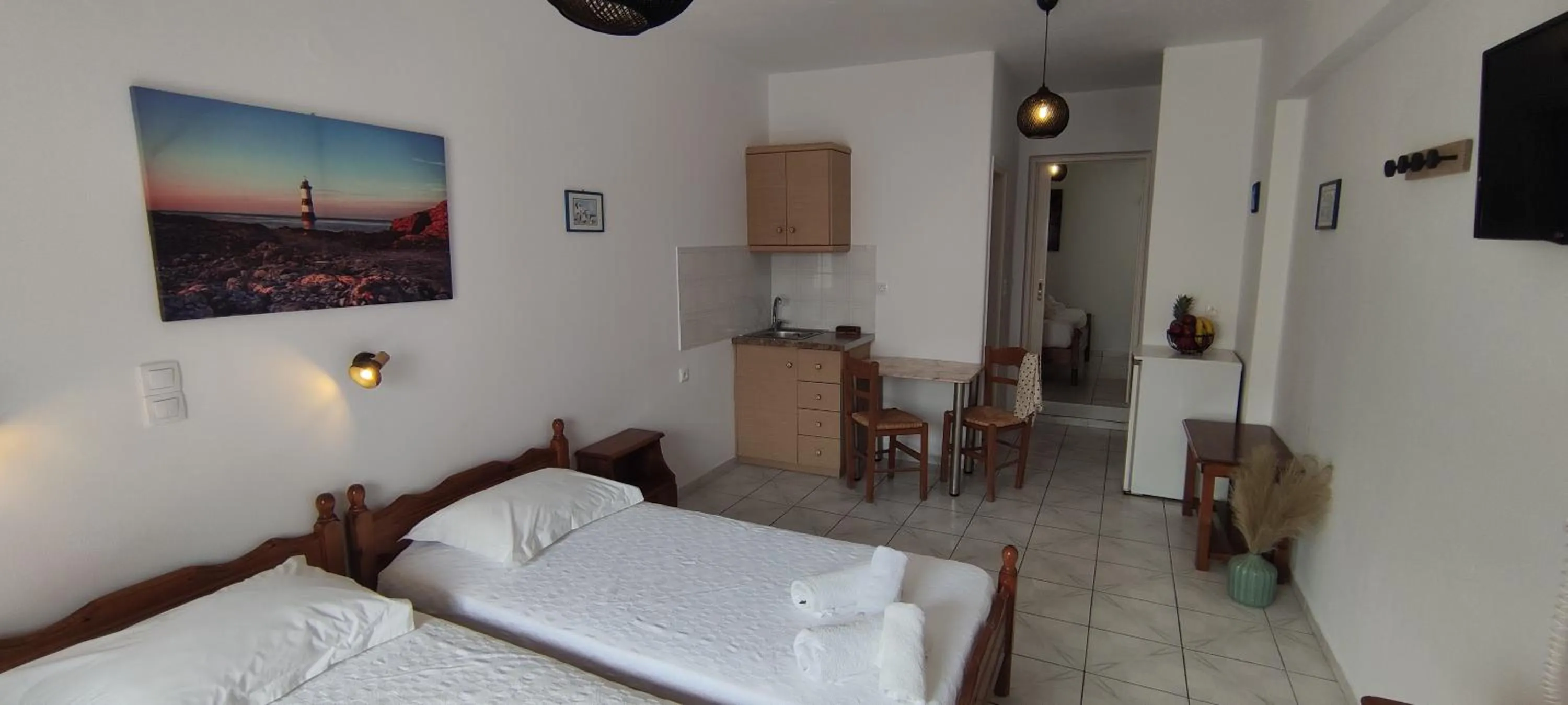 Bed in Kapetanos Rooms