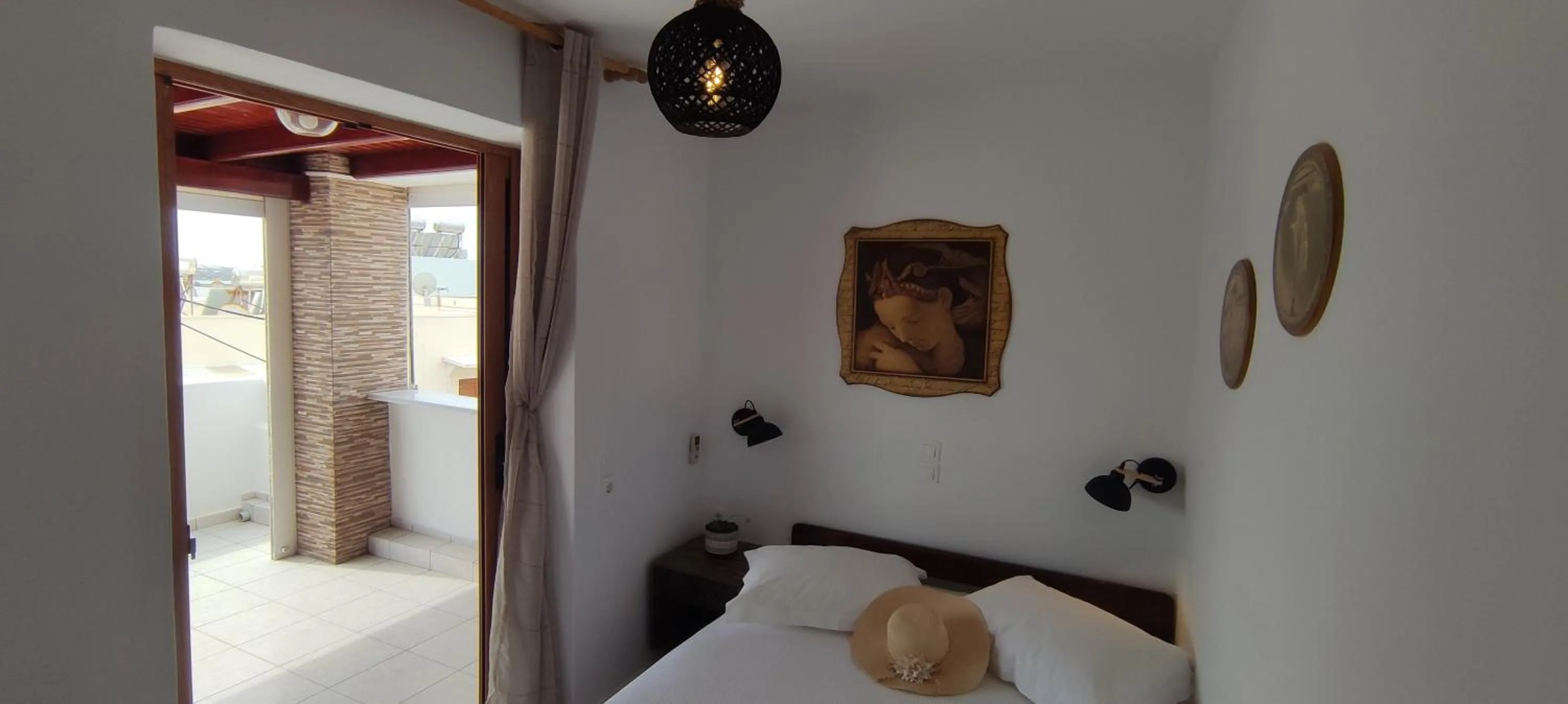 Bed in Kapetanos Rooms