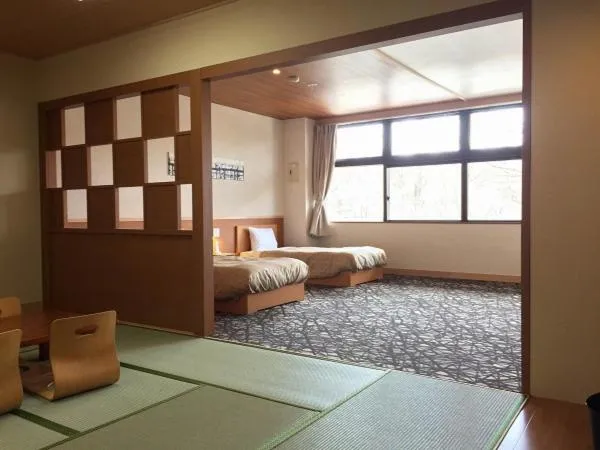 Photo of the whole room, Bed in Itoen Hotel Kusatsu