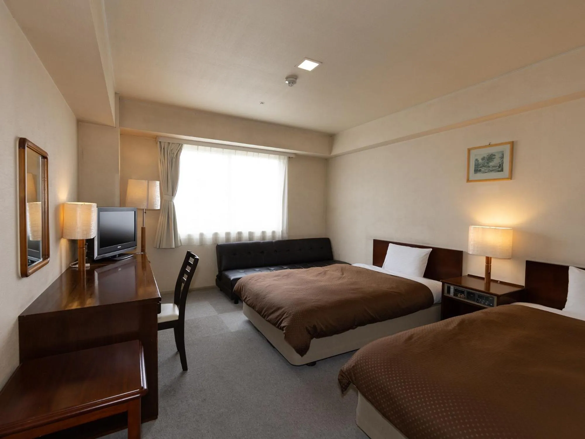 Bed in Komoro Grand Castle Hotel