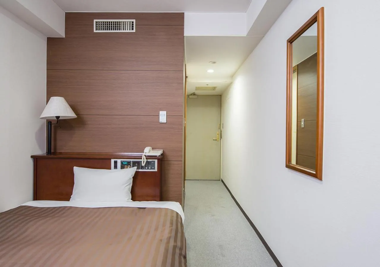 Bed in Komoro Grand Castle Hotel