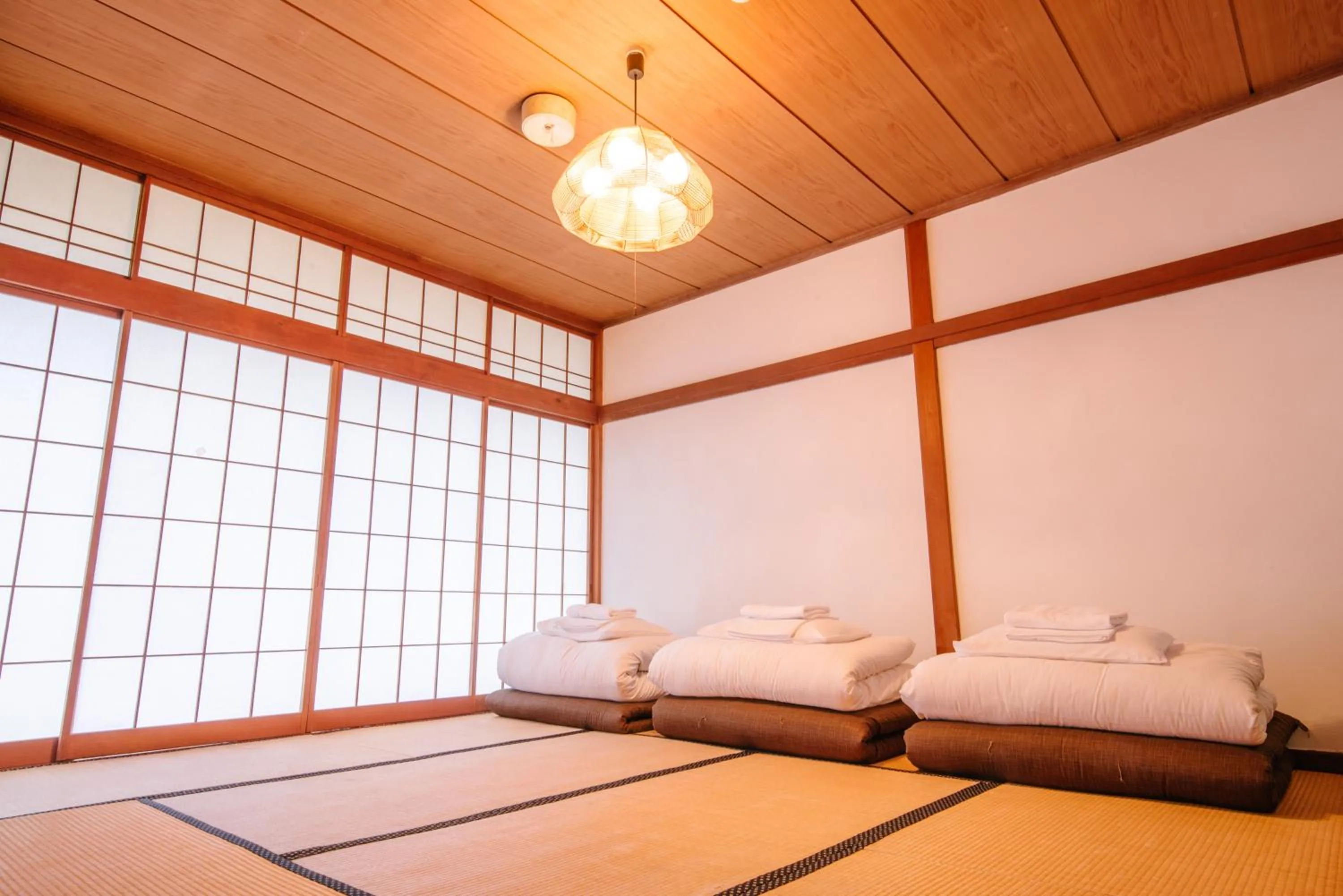 Bed in Irori Guest House Tenmaku