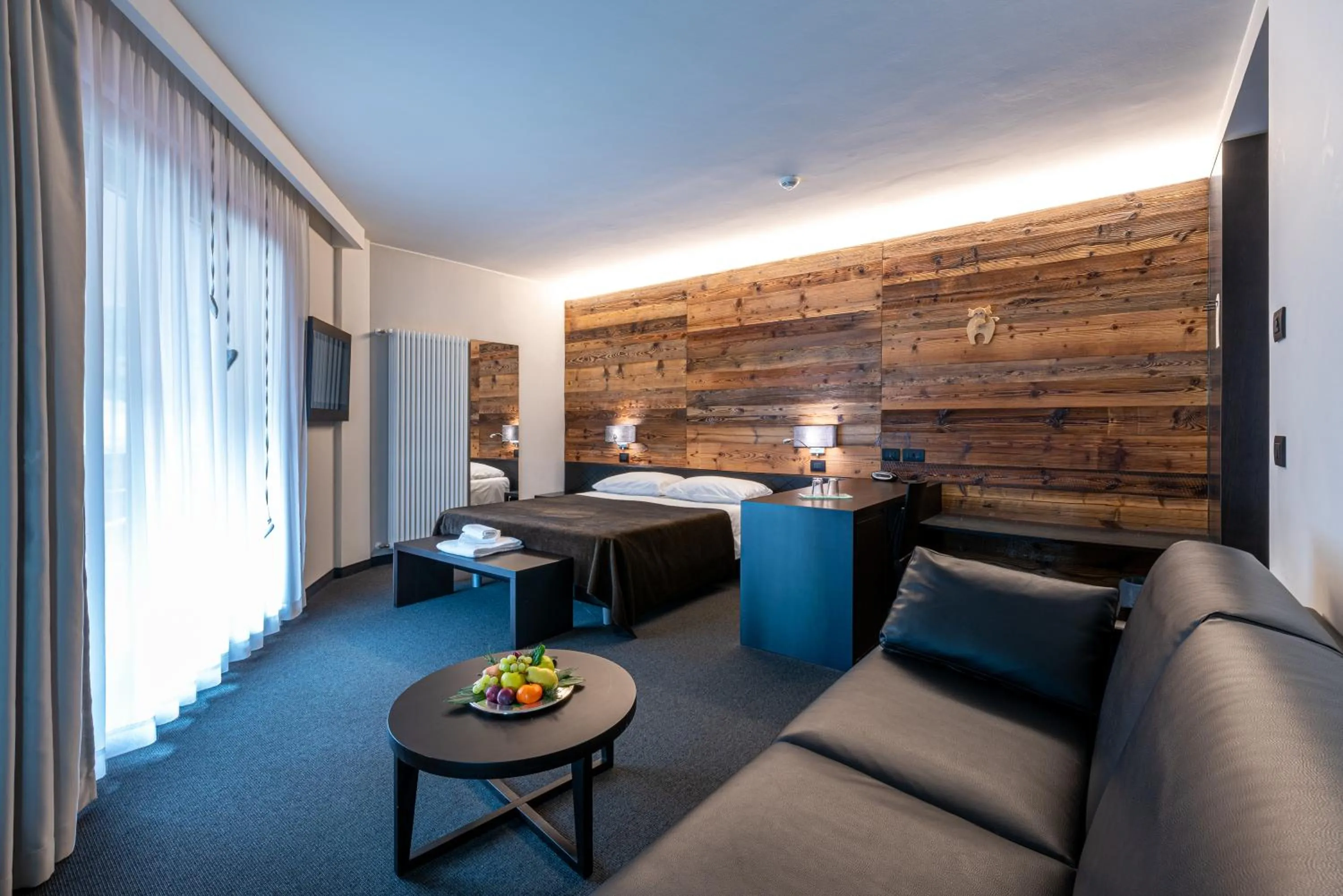 Bedroom in Hotel La Perla