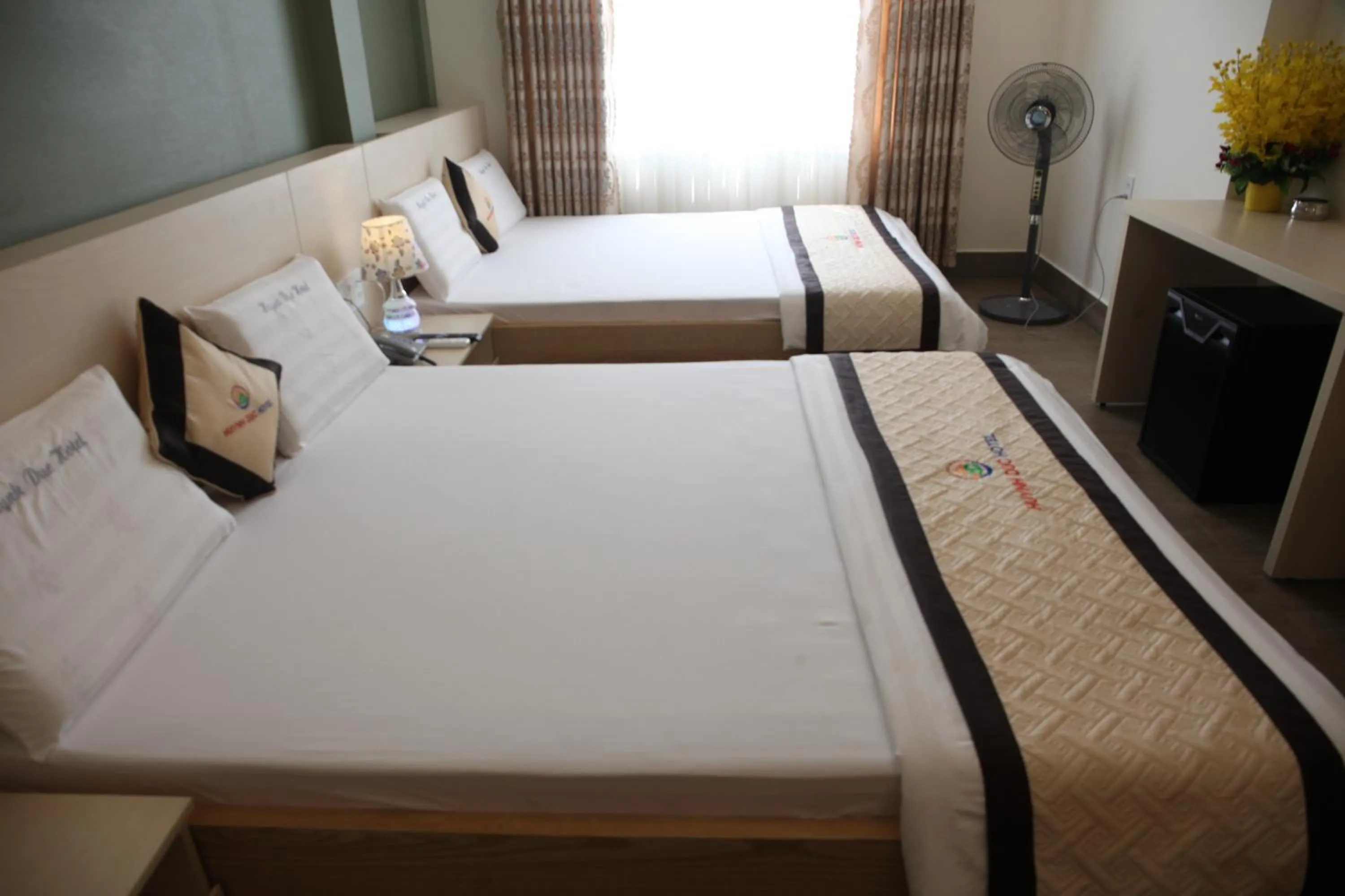 Bed in Huynh Duc 2 Hotel