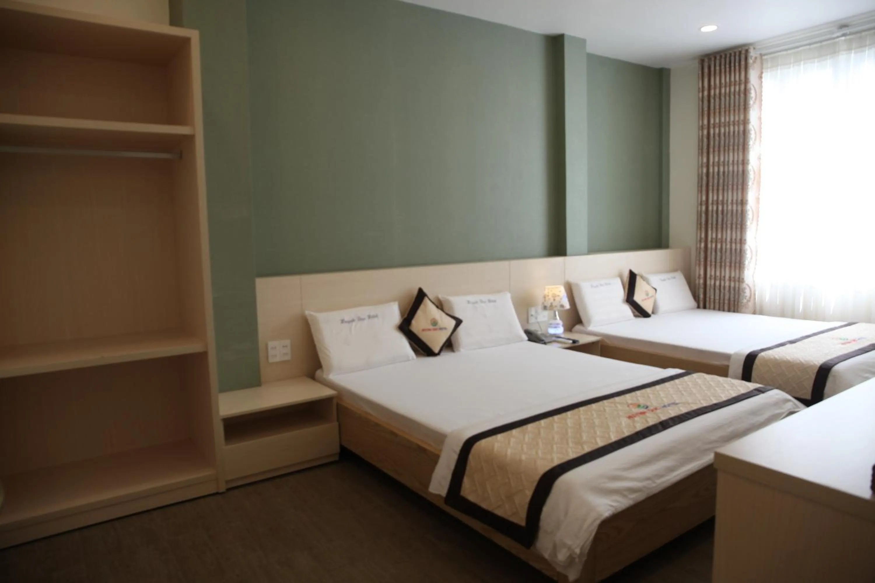 Bed in Huynh Duc 2 Hotel