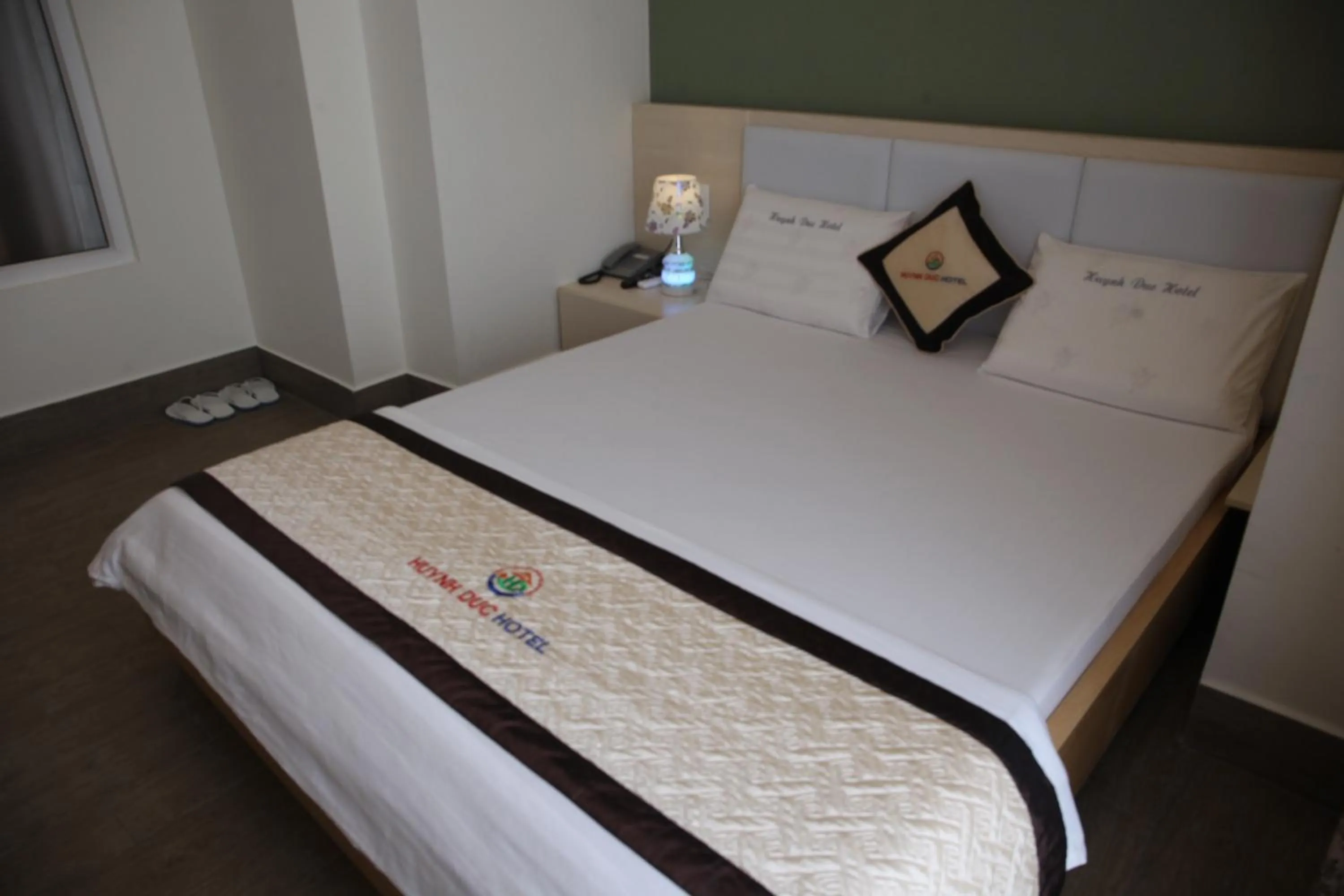 Bed in Huynh Duc 2 Hotel
