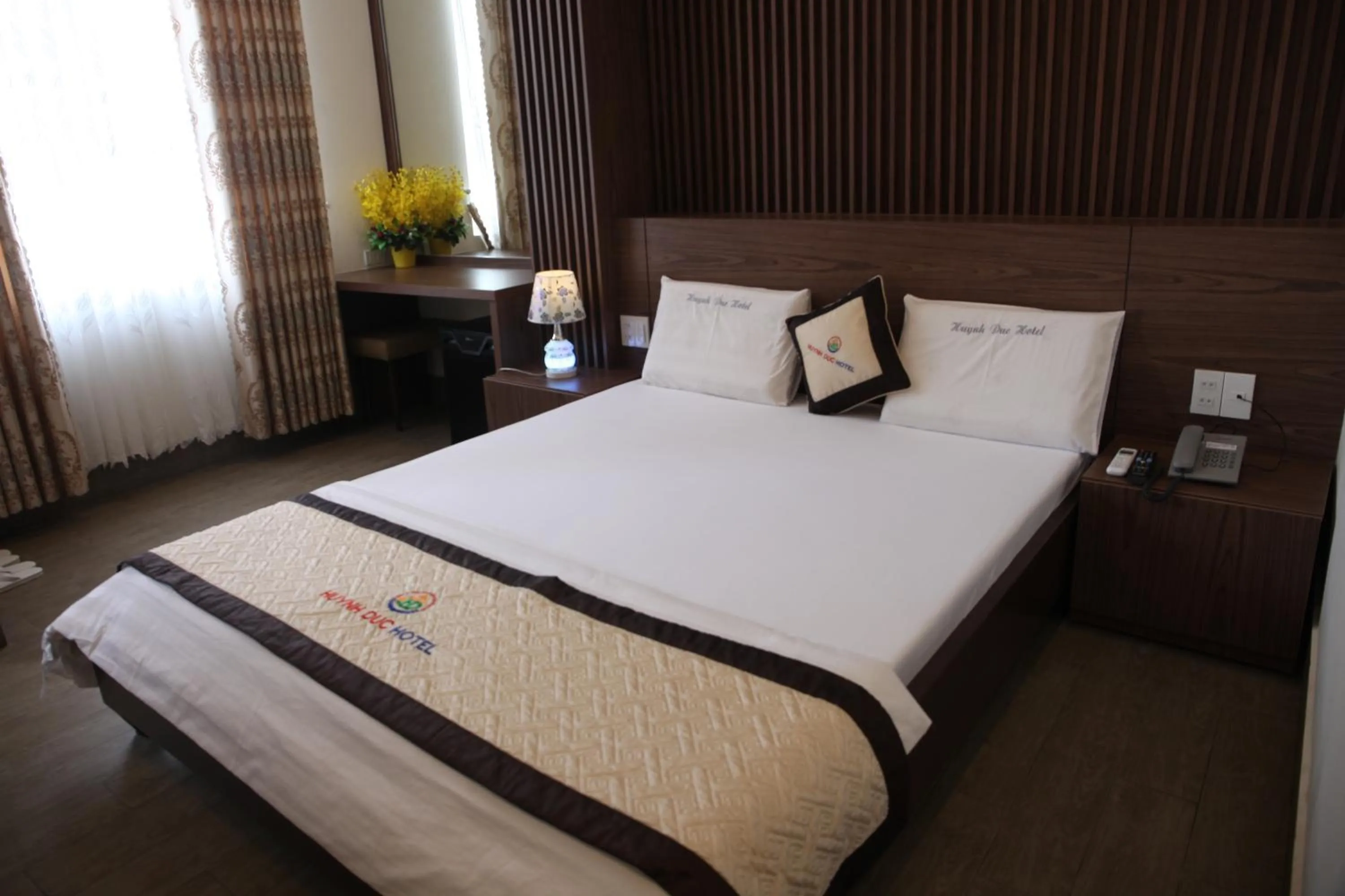 Bed in Huynh Duc 2 Hotel