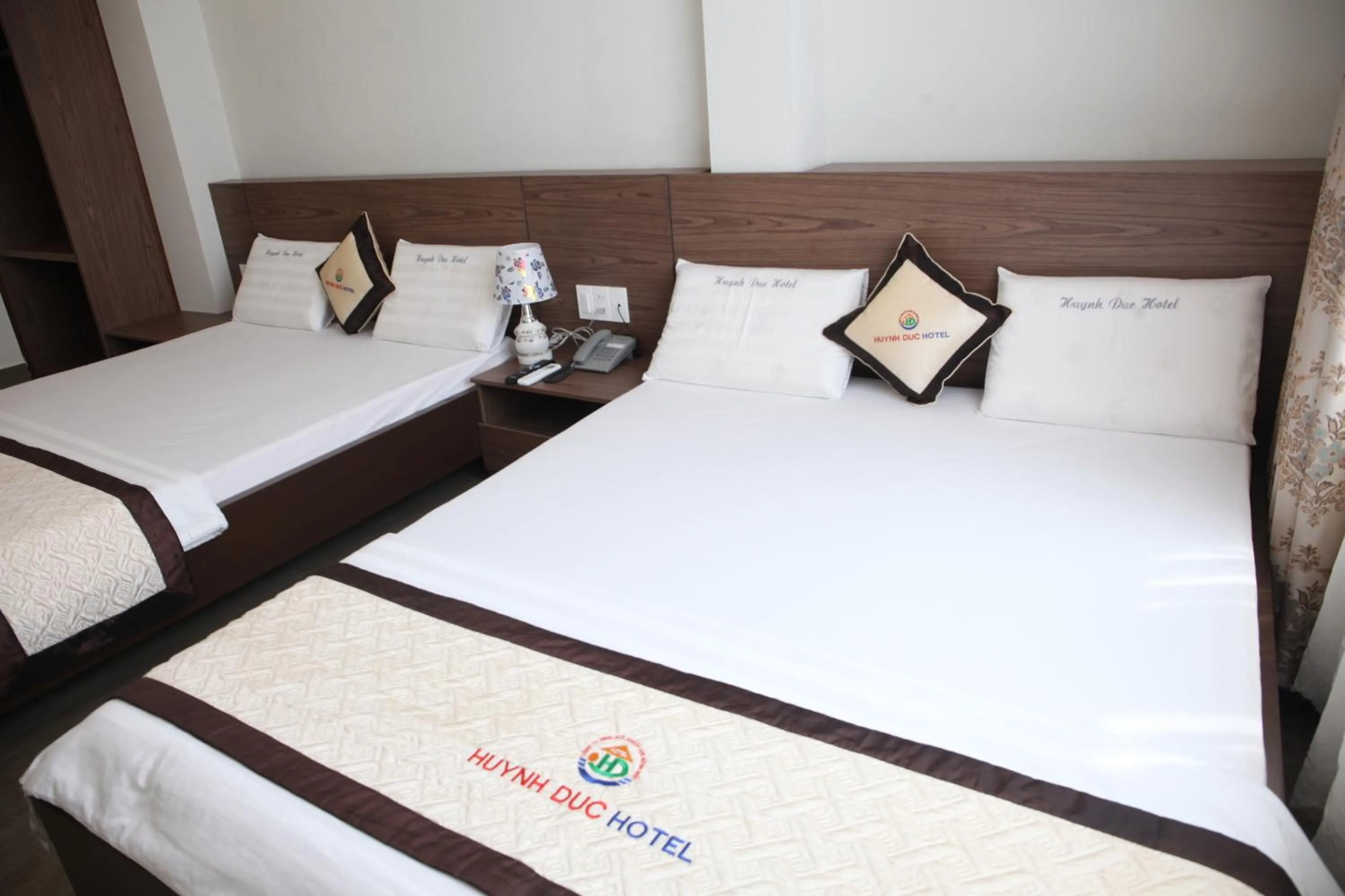Bed in Huynh Duc 2 Hotel