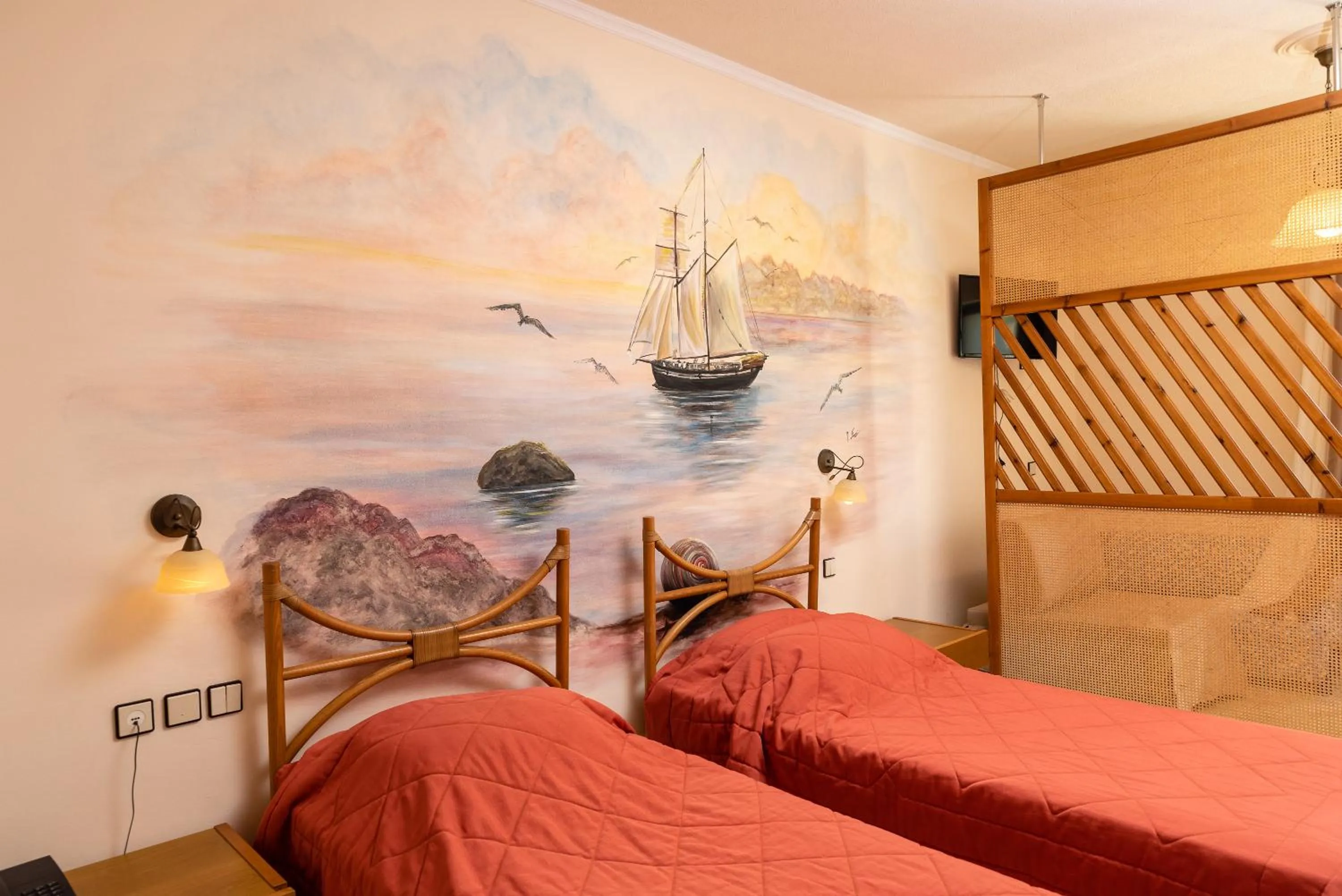 Bed in Golden Sand Hotel