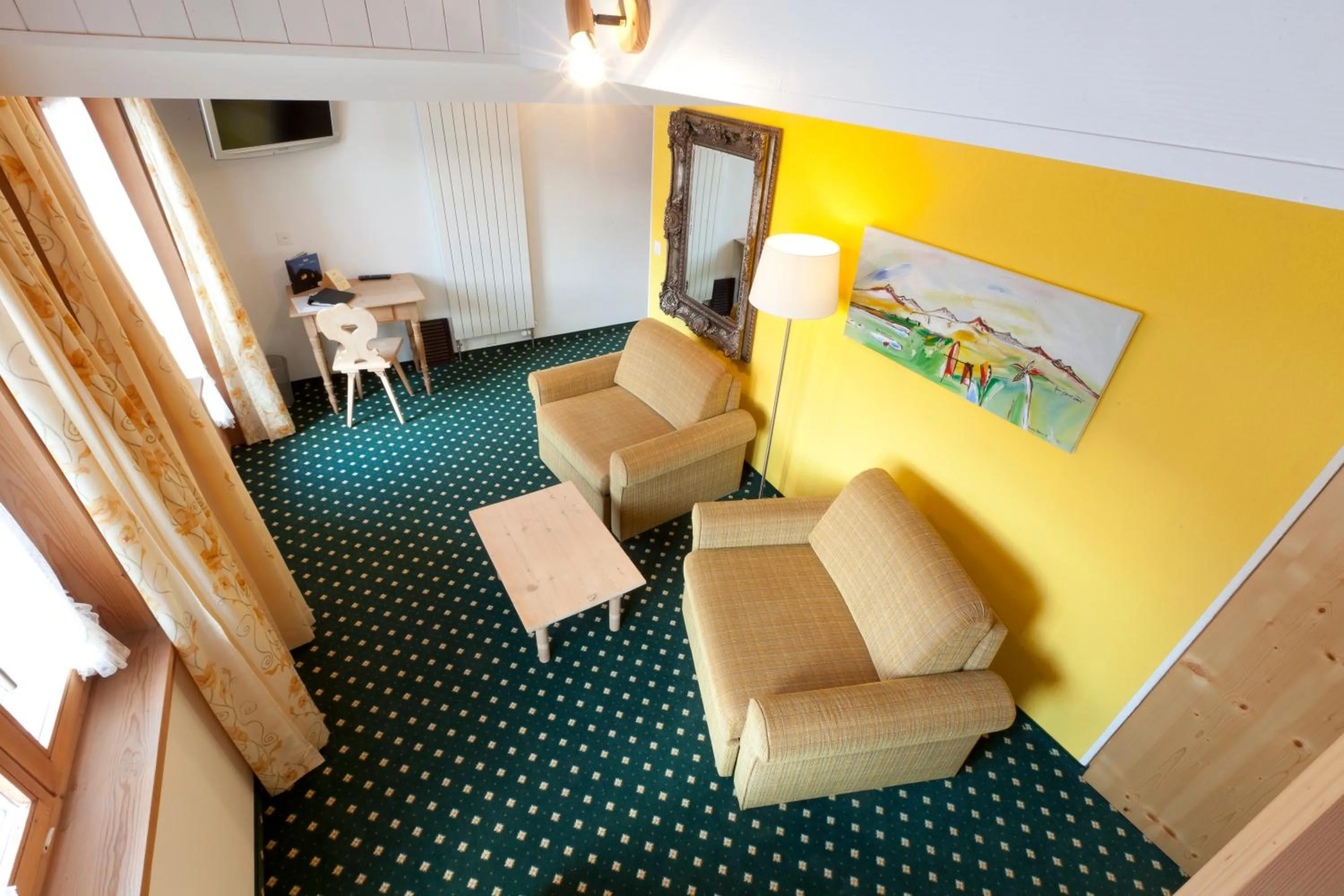 Communal lounge/ TV room in Hotel Posta