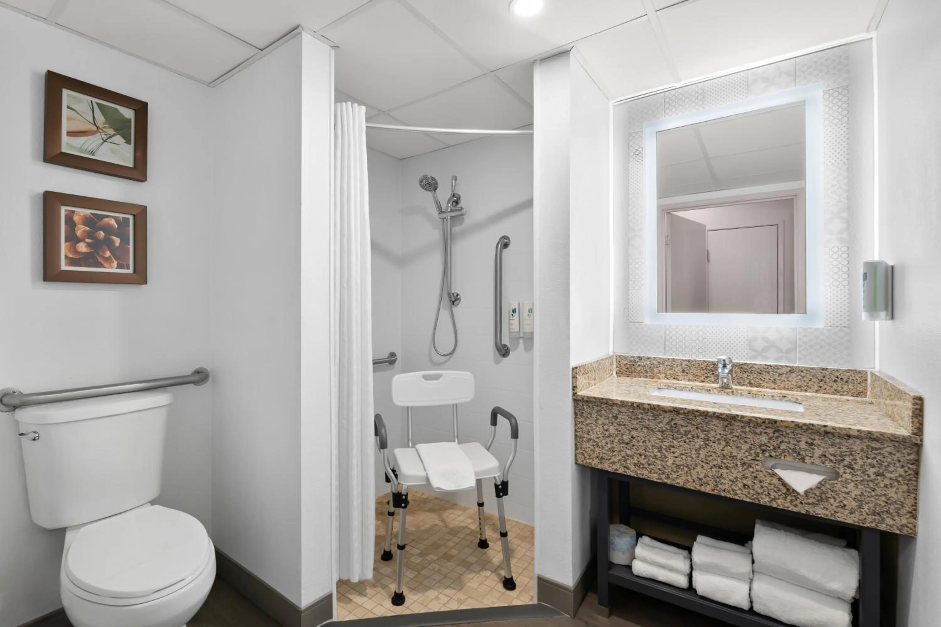 Shower in Country Inn & Suites by Radisson, Near The National Sports Center, Coon Rapids, MN