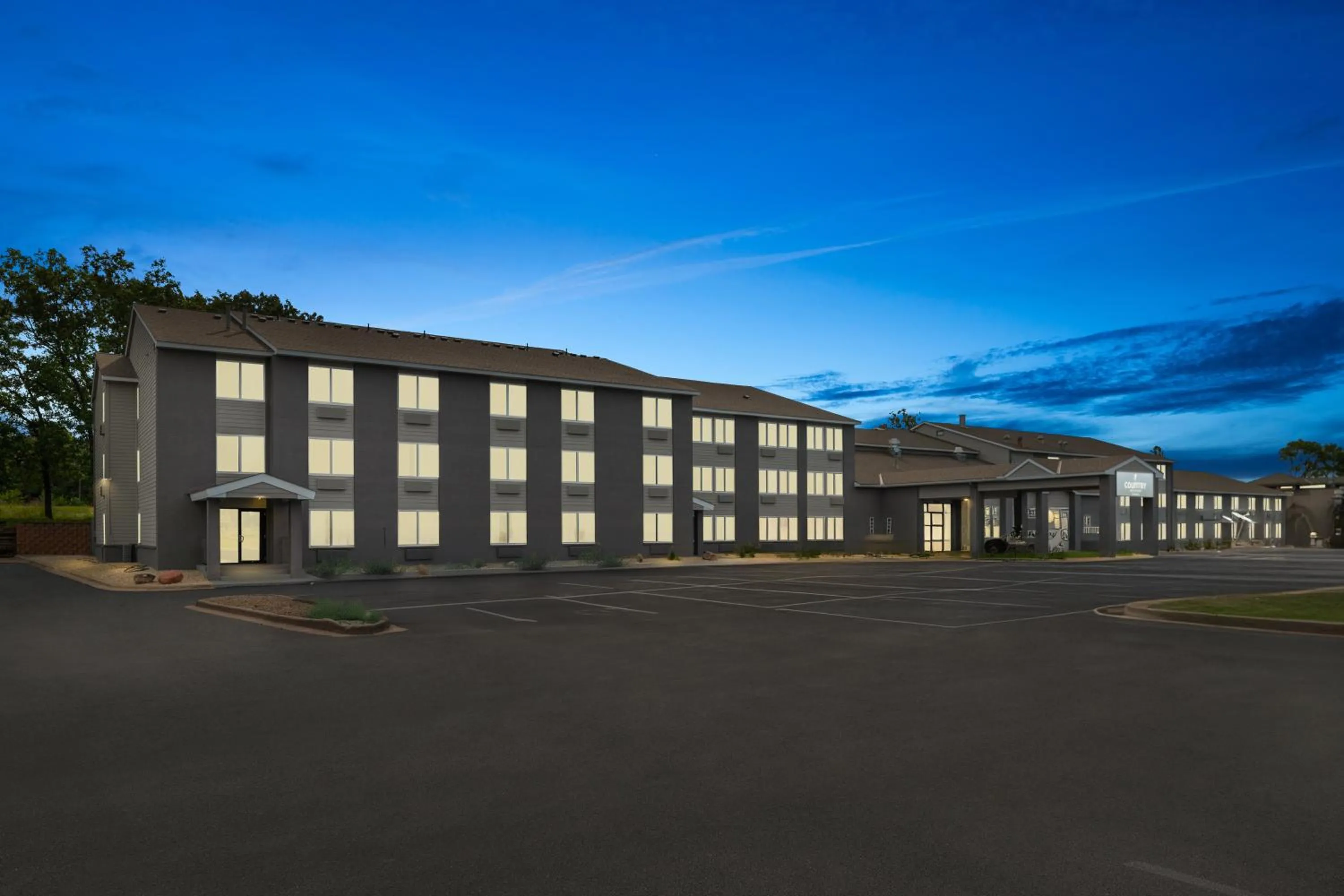 Property building in Country Inn & Suites by Radisson, Near The National Sports Center, Coon Rapids, MN