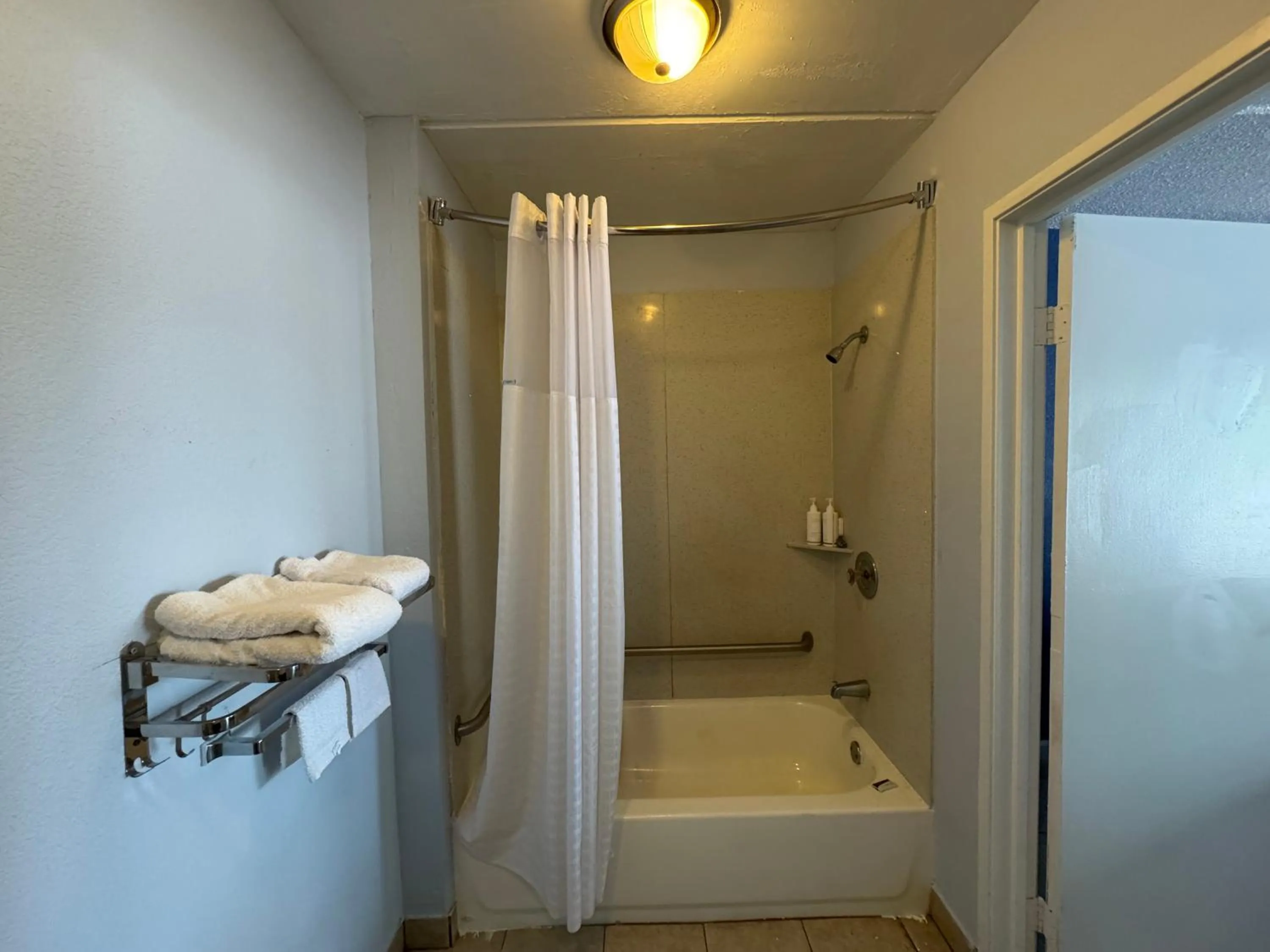 Bathroom in Days Inn by Wyndham Charlotte University