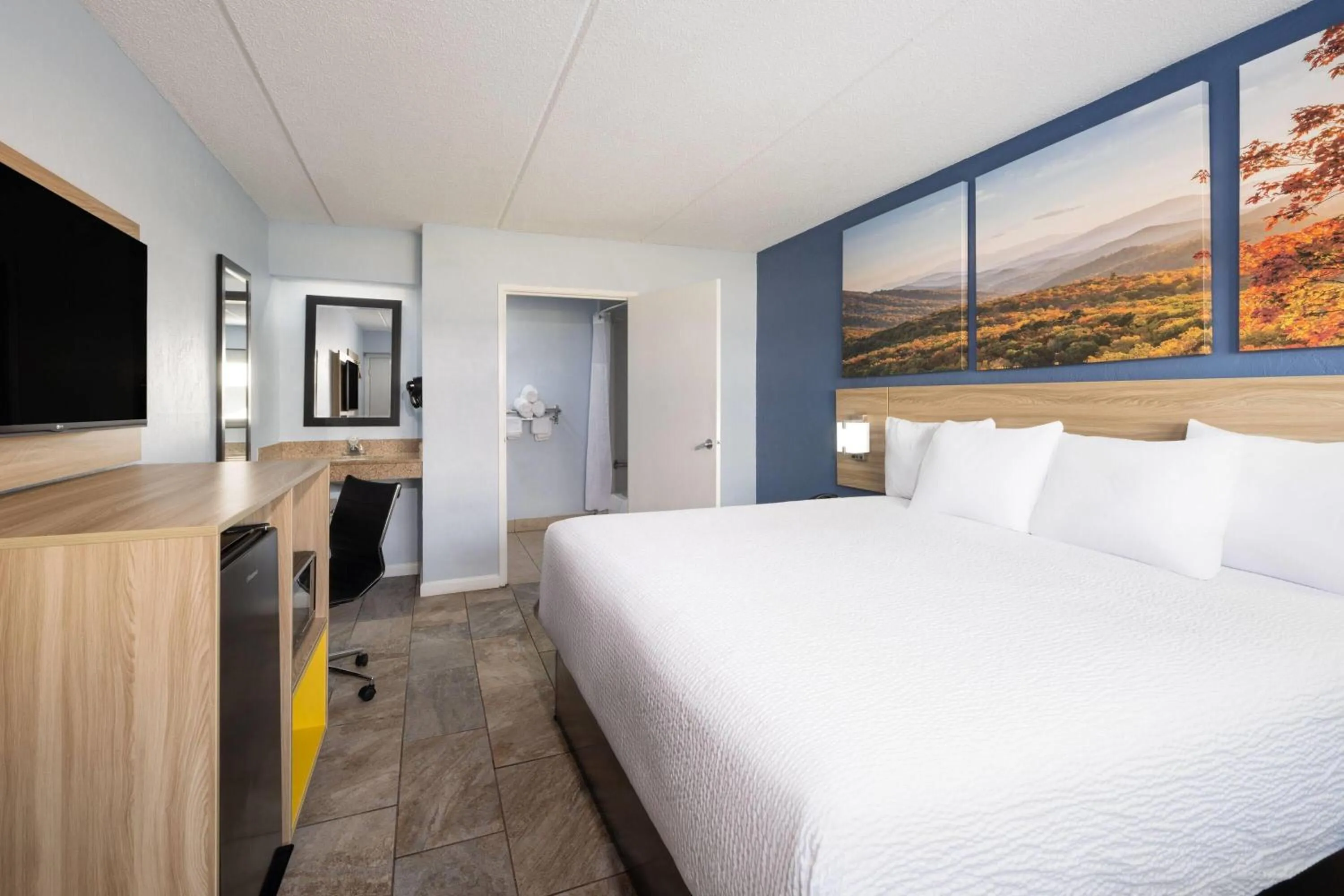 Photo of the whole room, Bed in Days Inn by Wyndham Charlotte University