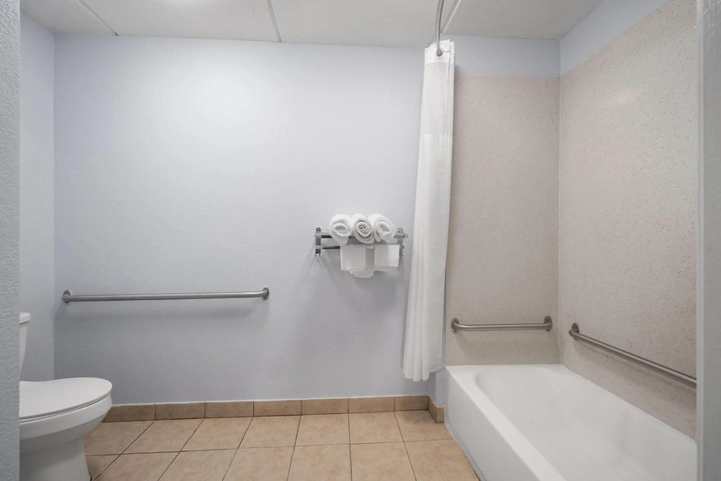Bathroom in Days Inn by Wyndham Charlotte University