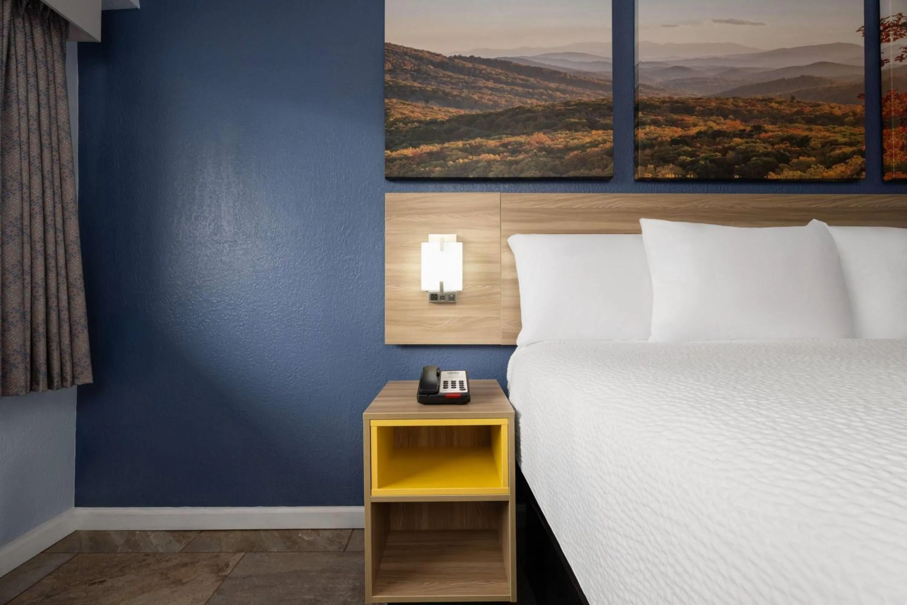 Photo of the whole room, Bed in Days Inn by Wyndham Charlotte University