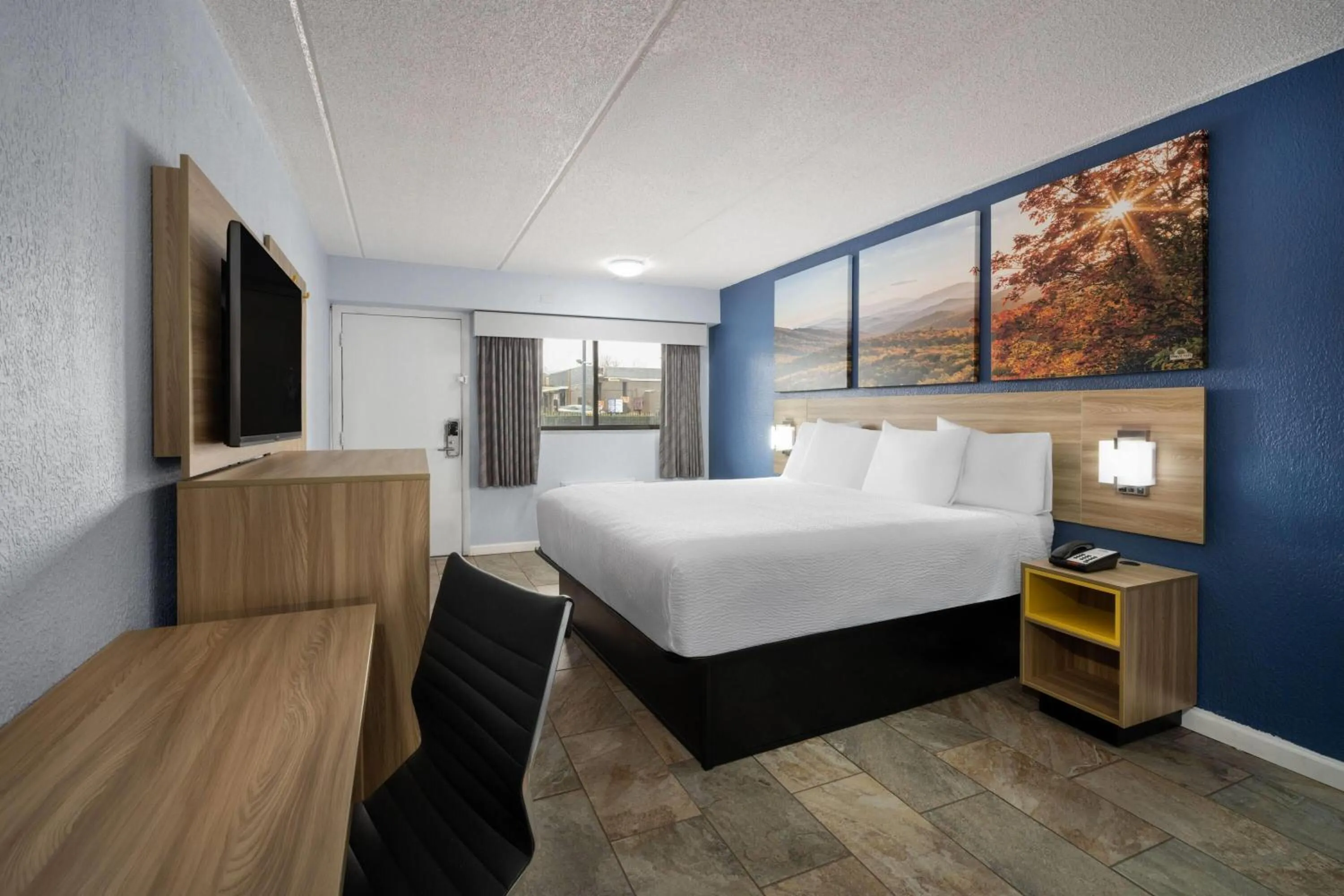 Photo of the whole room, Bed in Days Inn by Wyndham Charlotte University