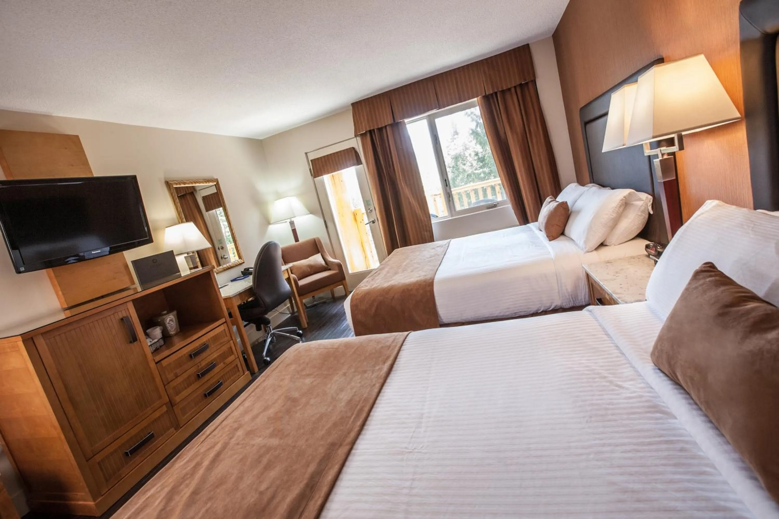 Photo of the whole room, Bed in Coast Hillcrest Hotel