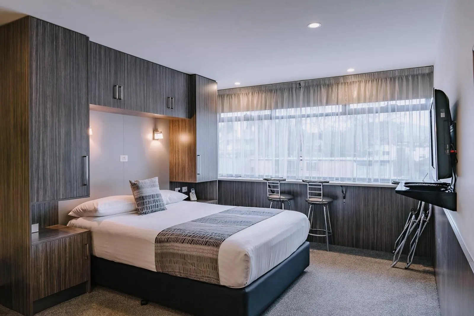 Bed in 429 Apartments & Suites