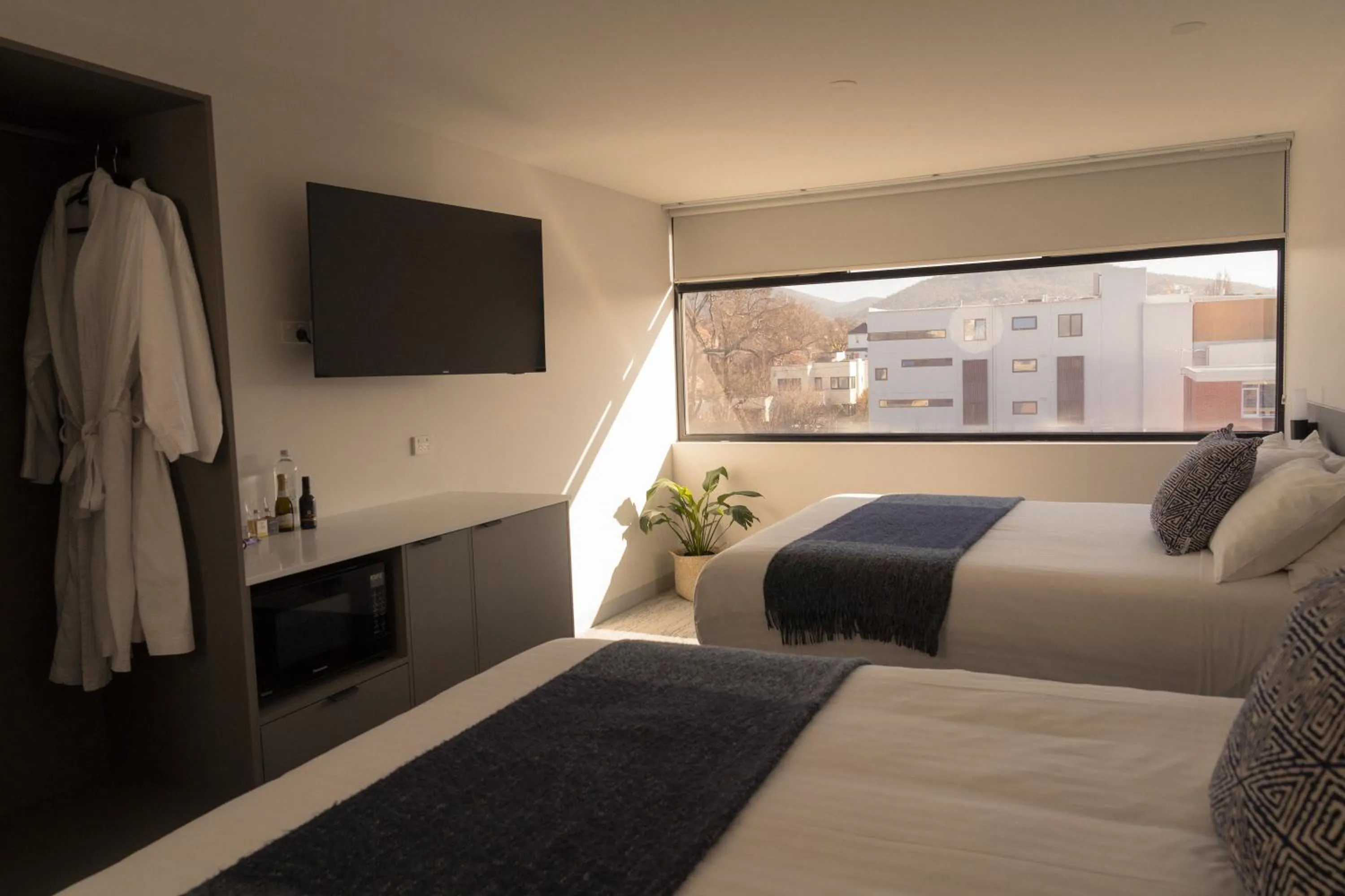 Bed in 429 Apartments & Suites