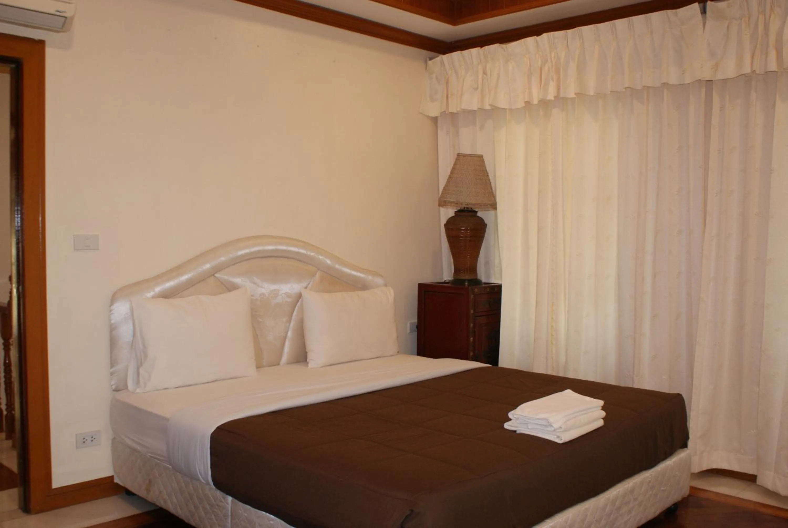 Bed in Prince Edouard Apartments & Resort Patong Beach Phuket