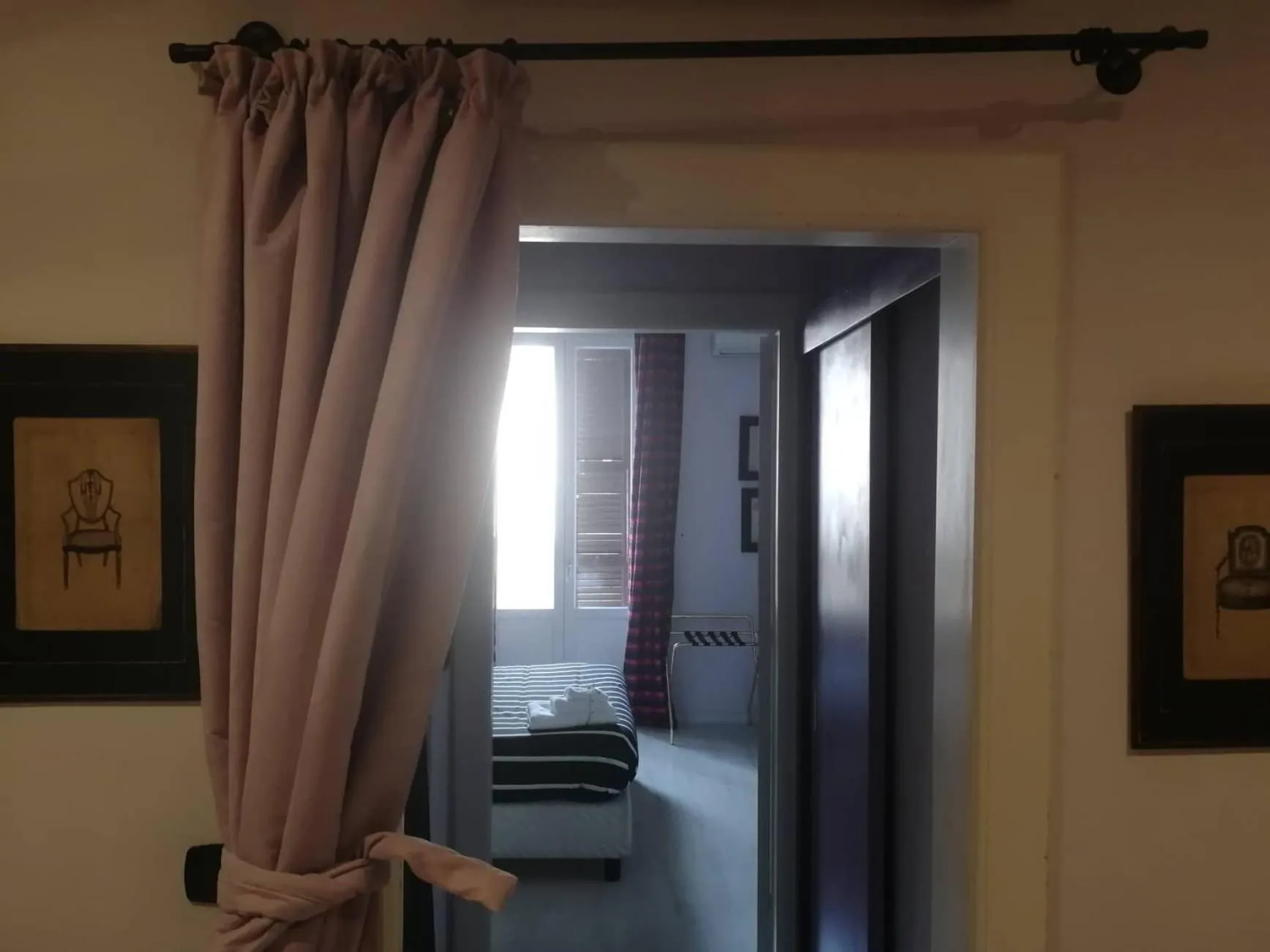 Bedroom in Gatto Bianco Casa Dei Venti