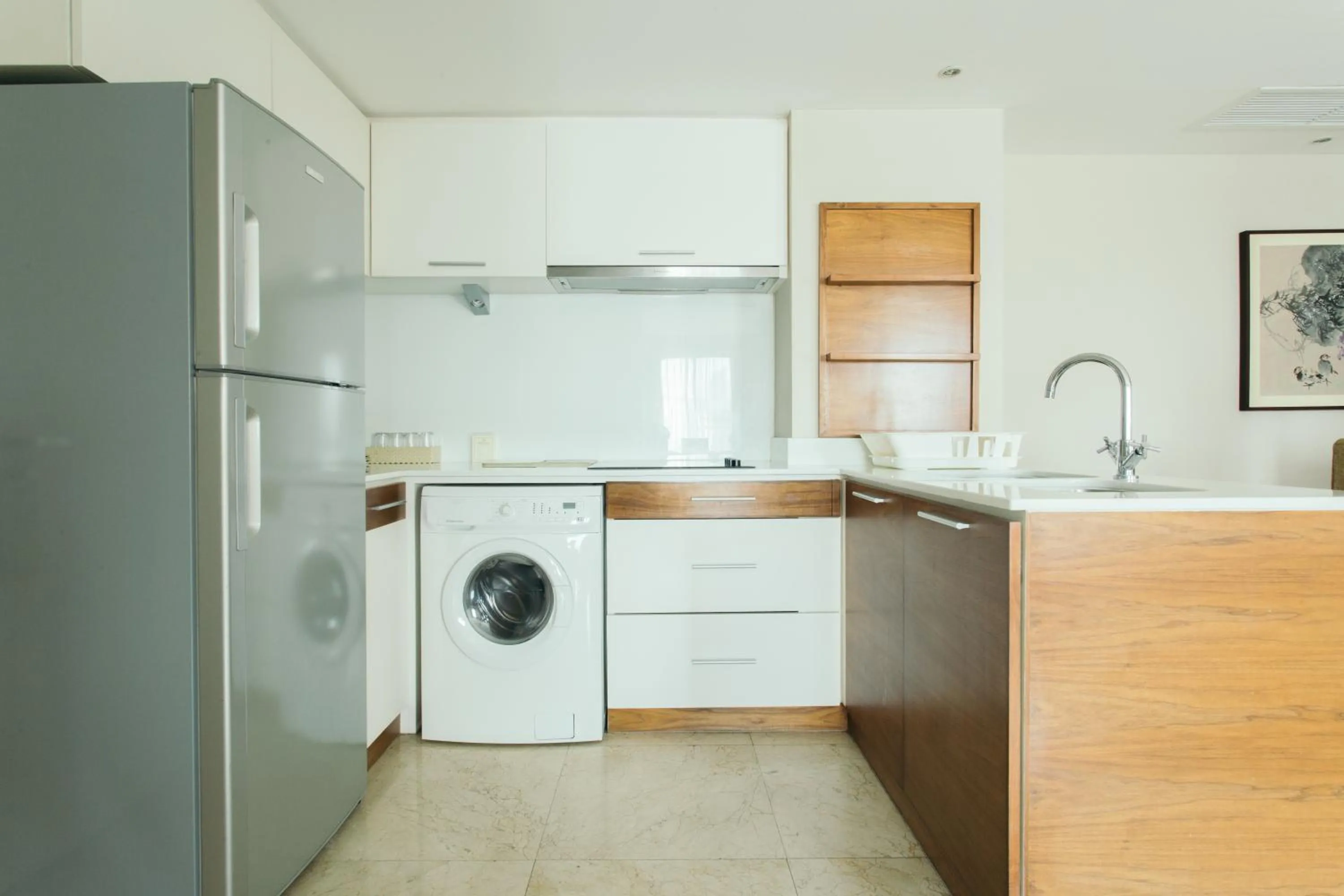 Kitchen or kitchenette in Thomson Residence Hotel