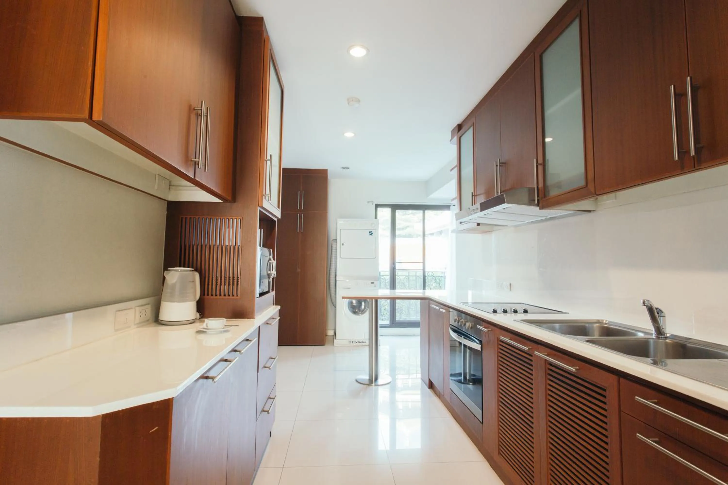 Kitchen or kitchenette in Thomson Residence Hotel