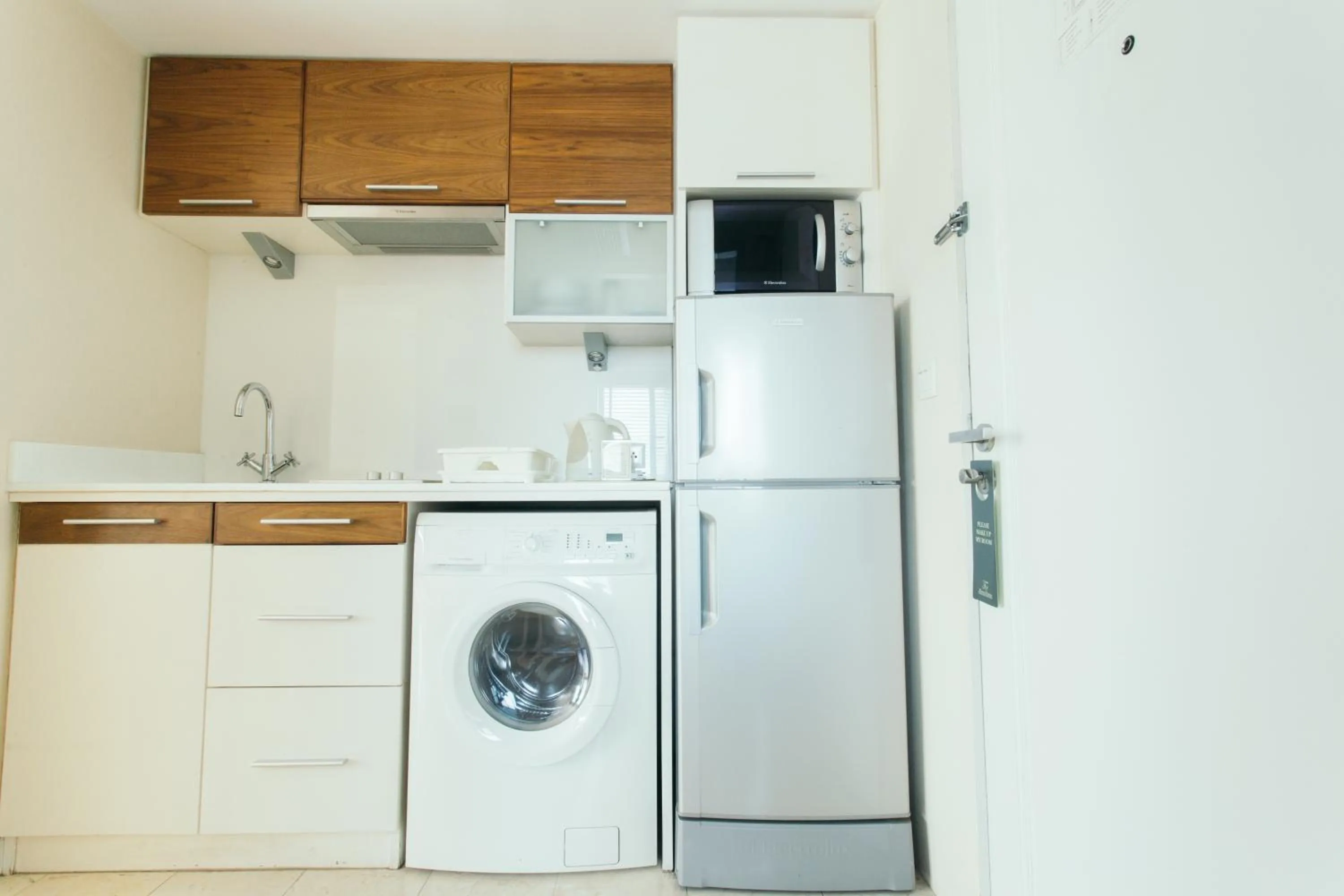 Kitchen or kitchenette in Thomson Residence Hotel