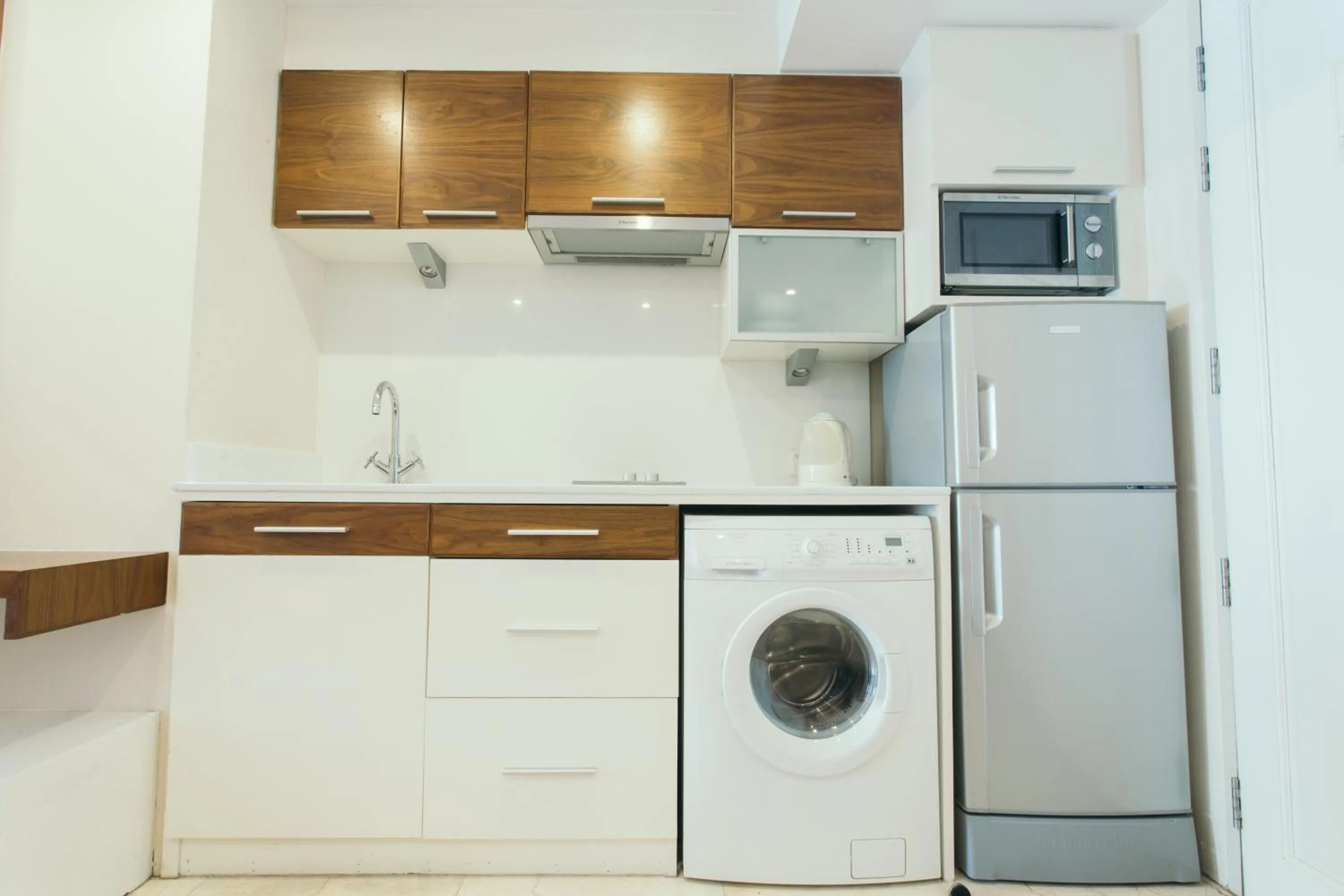 Kitchen or kitchenette in Thomson Residence Hotel