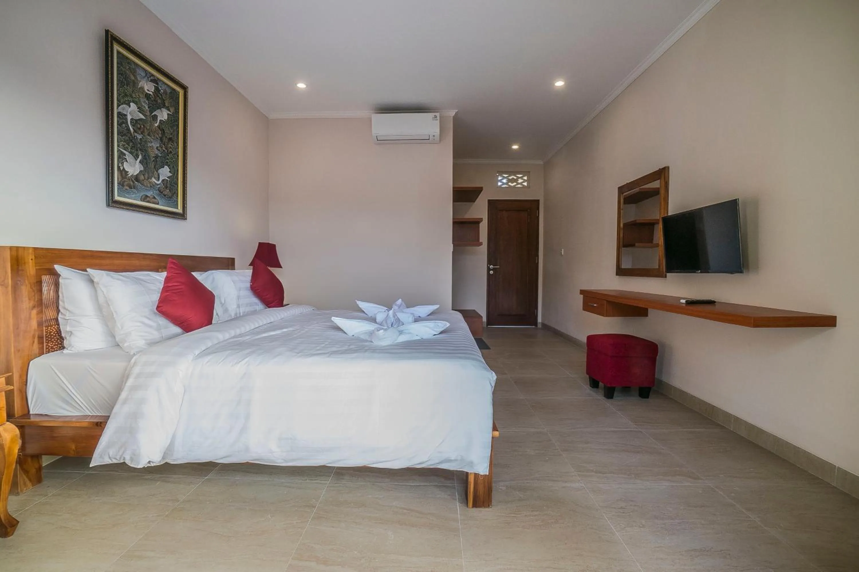 Communal lounge/ TV room, Bed in Jero Griya Ubud