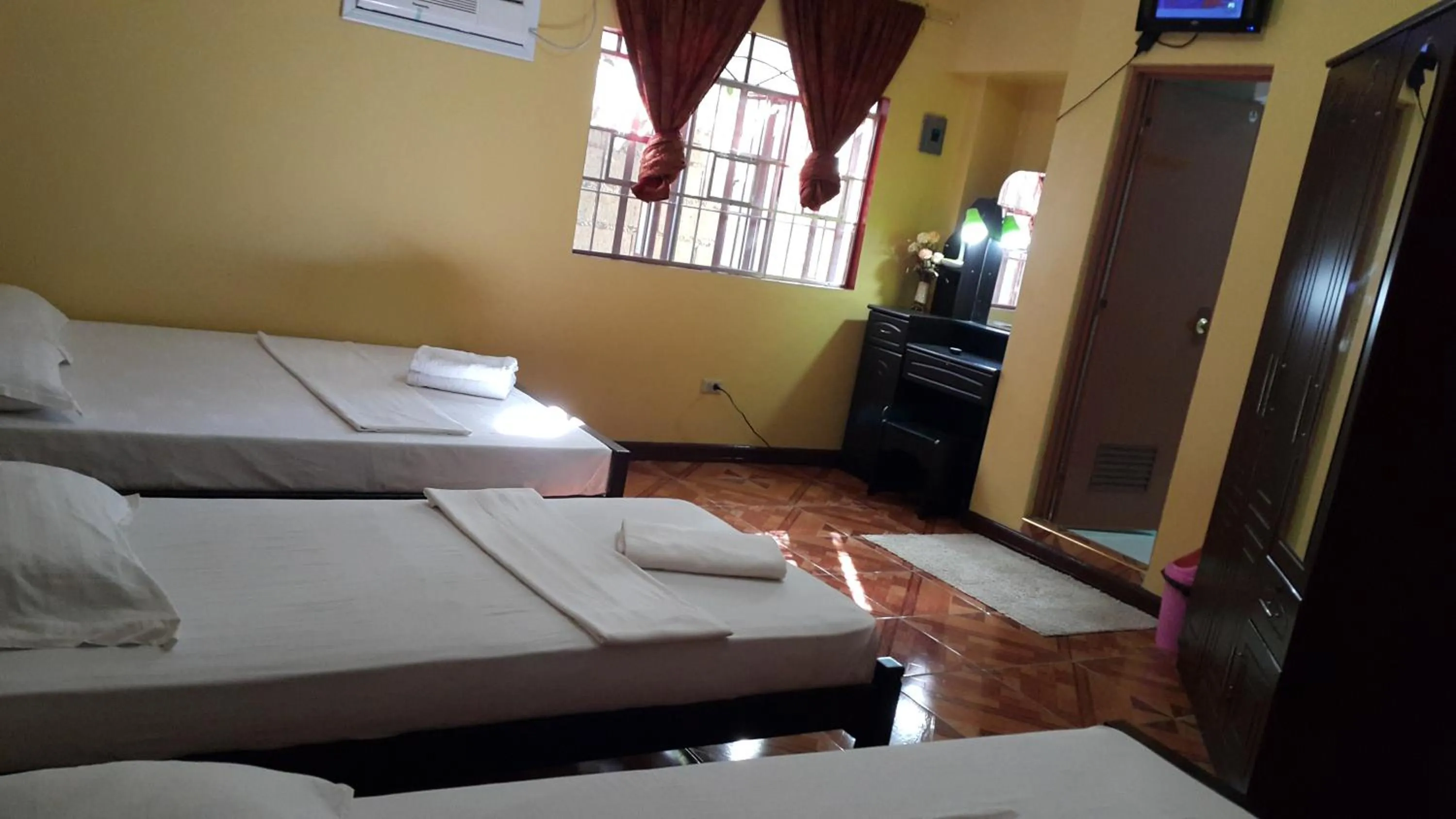 Bed in Carribean Transient House