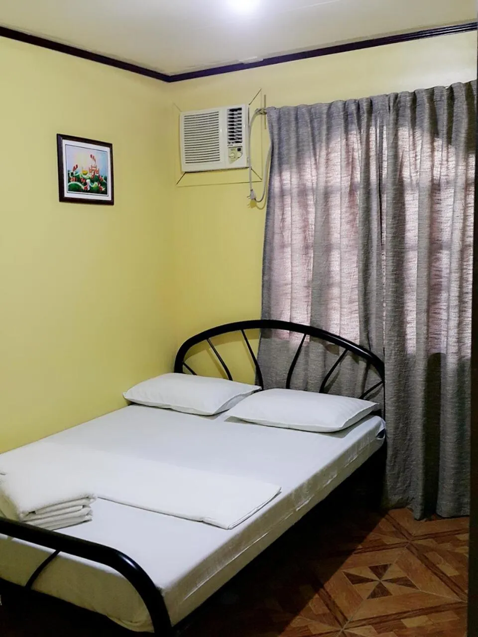 Bed in Carribean Transient House