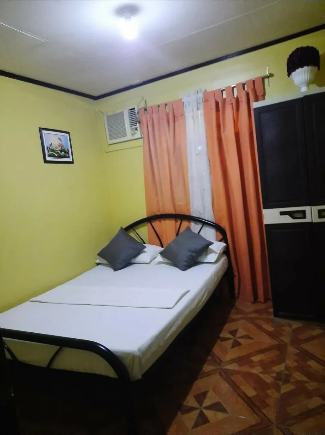 Bed in Carribean Transient House