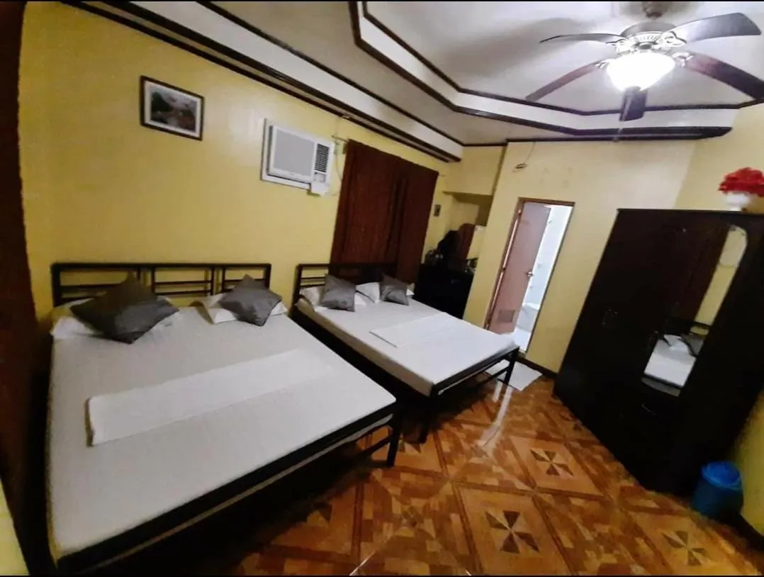 Bed in Carribean Transient House