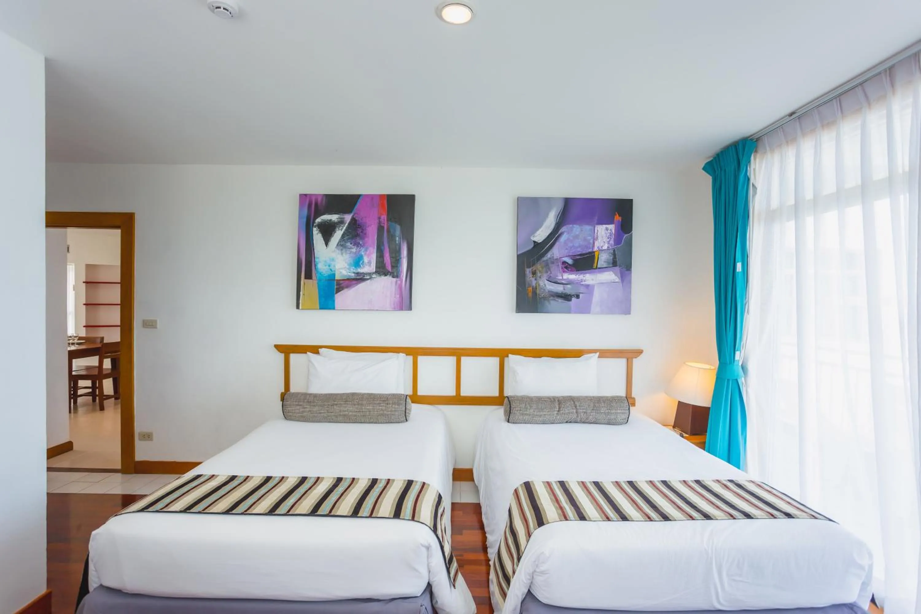 Photo of the whole room, Bed in Waterfront Suites Phuket by Centara