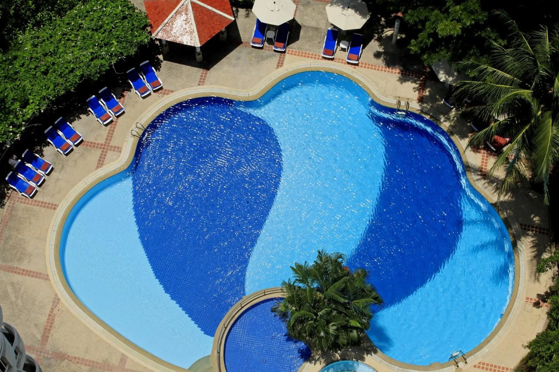 Swimming pool in Waterfront Suites Phuket by Centara