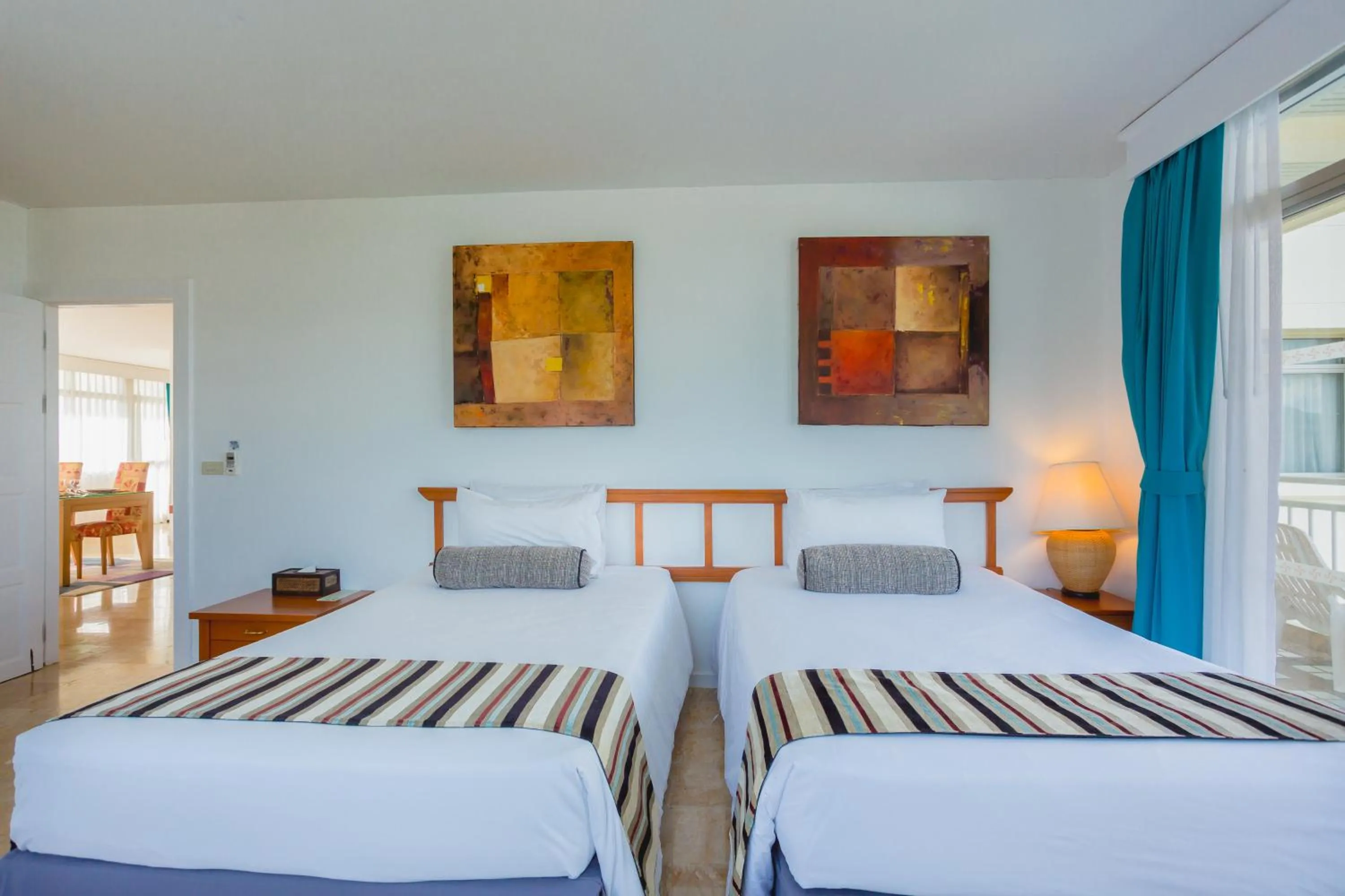 Photo of the whole room, Bed in Waterfront Suites Phuket by Centara