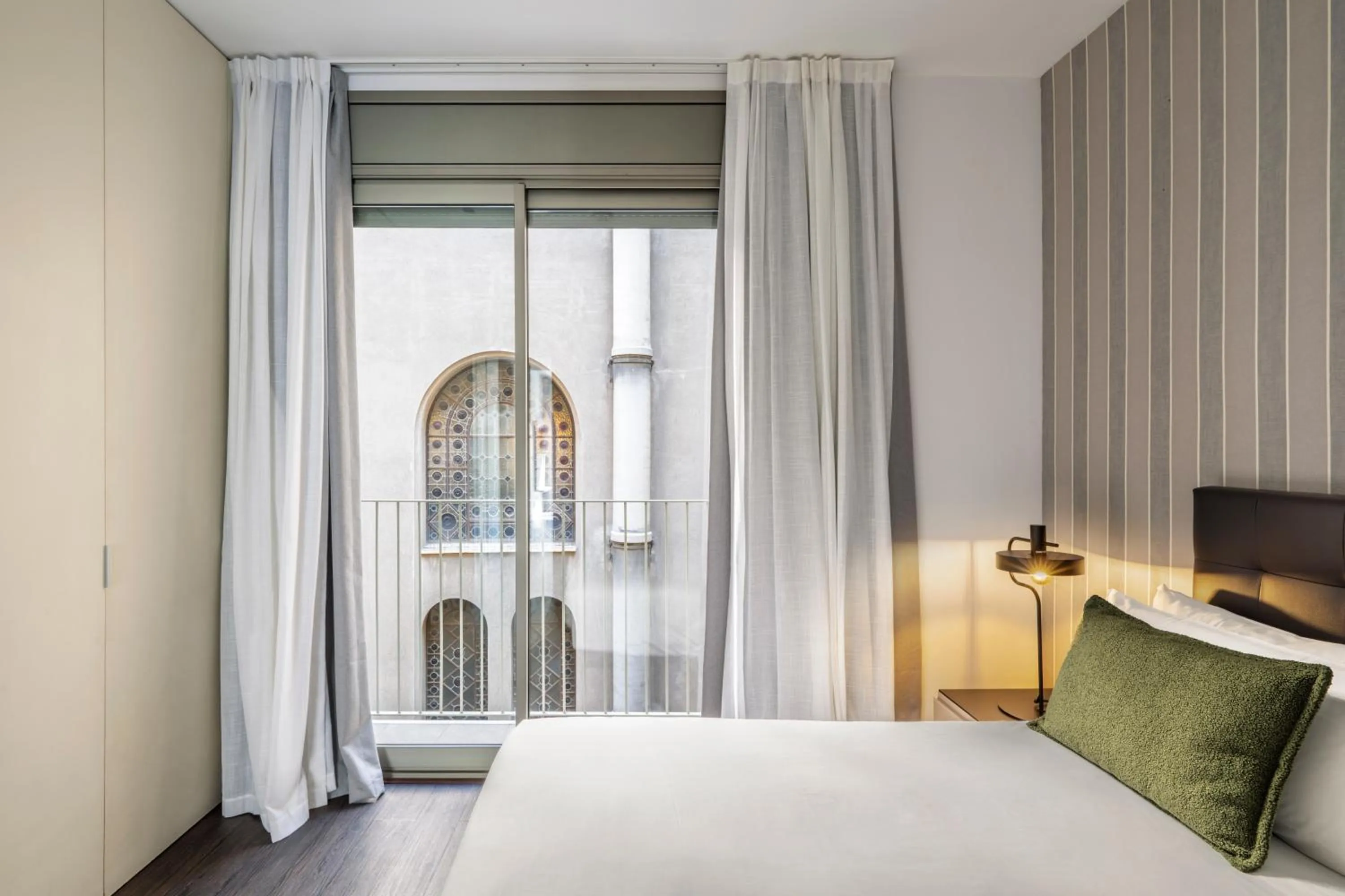 Bed in Aspasios Catedral Apartments