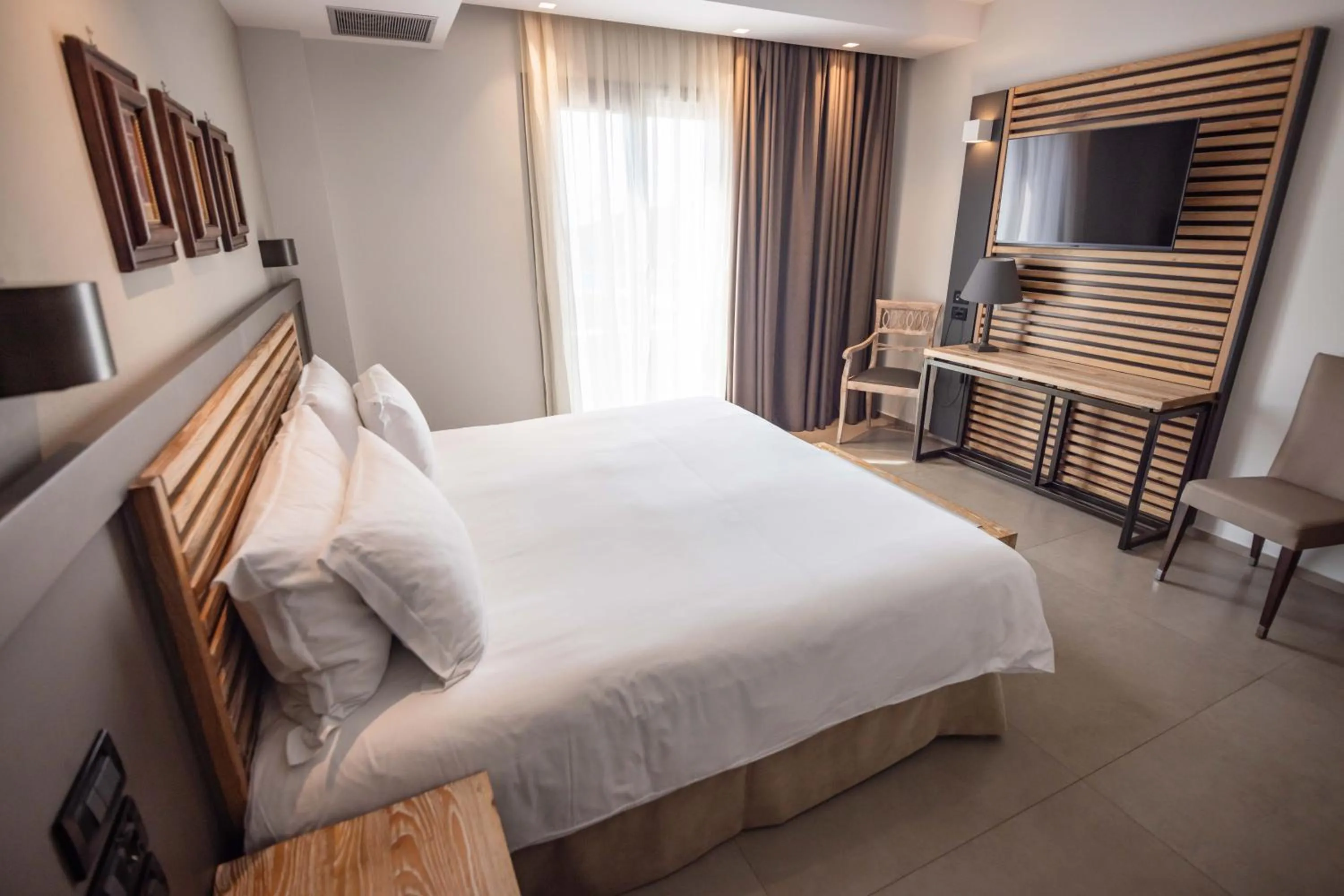 Bed in Movenpick Resort Agios Nikolaos Sivota